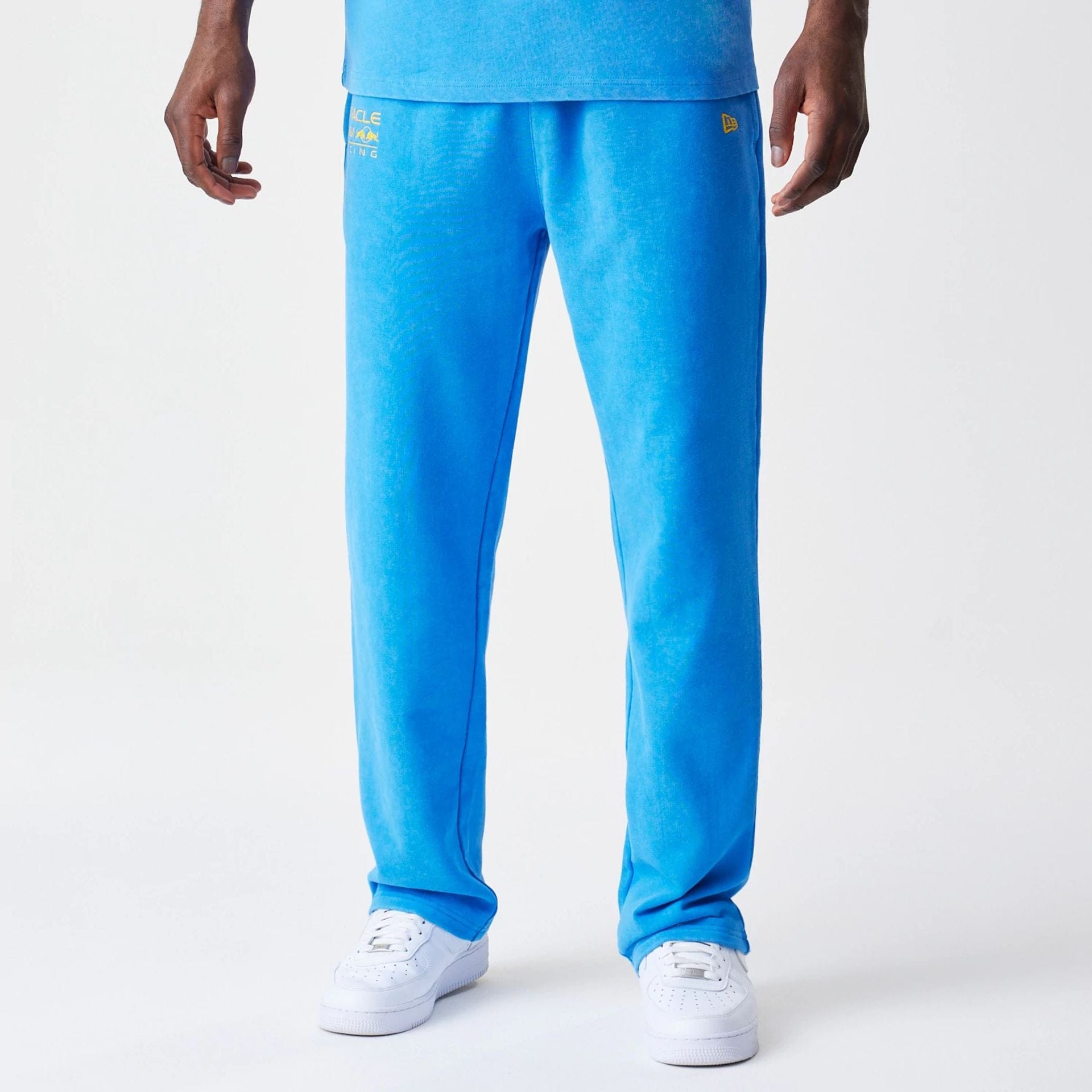 The Male model is wearing Red Bull Racing Blue Joggers 1