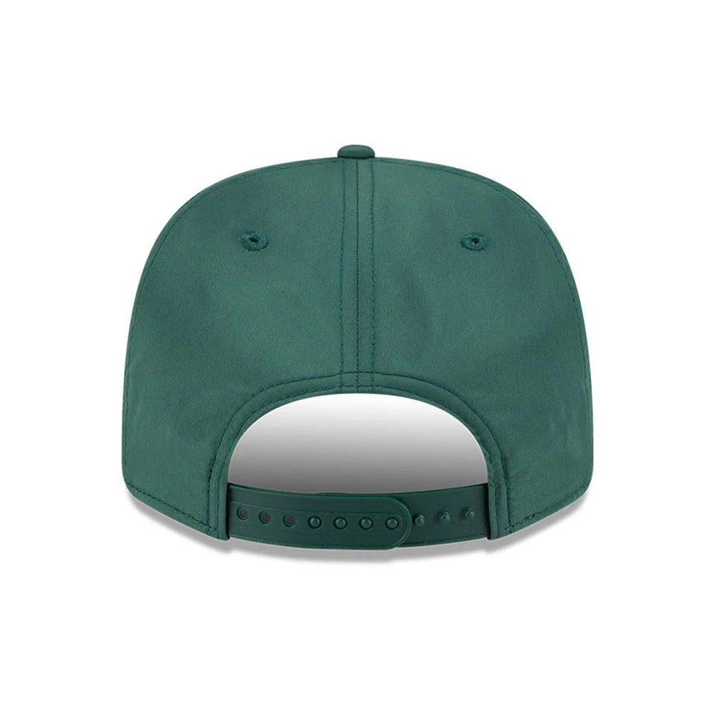 This is a Green Bay Packers NFL Coach Dark Green 9SEVENTY Stretch Snap Adjustable Cap 7
