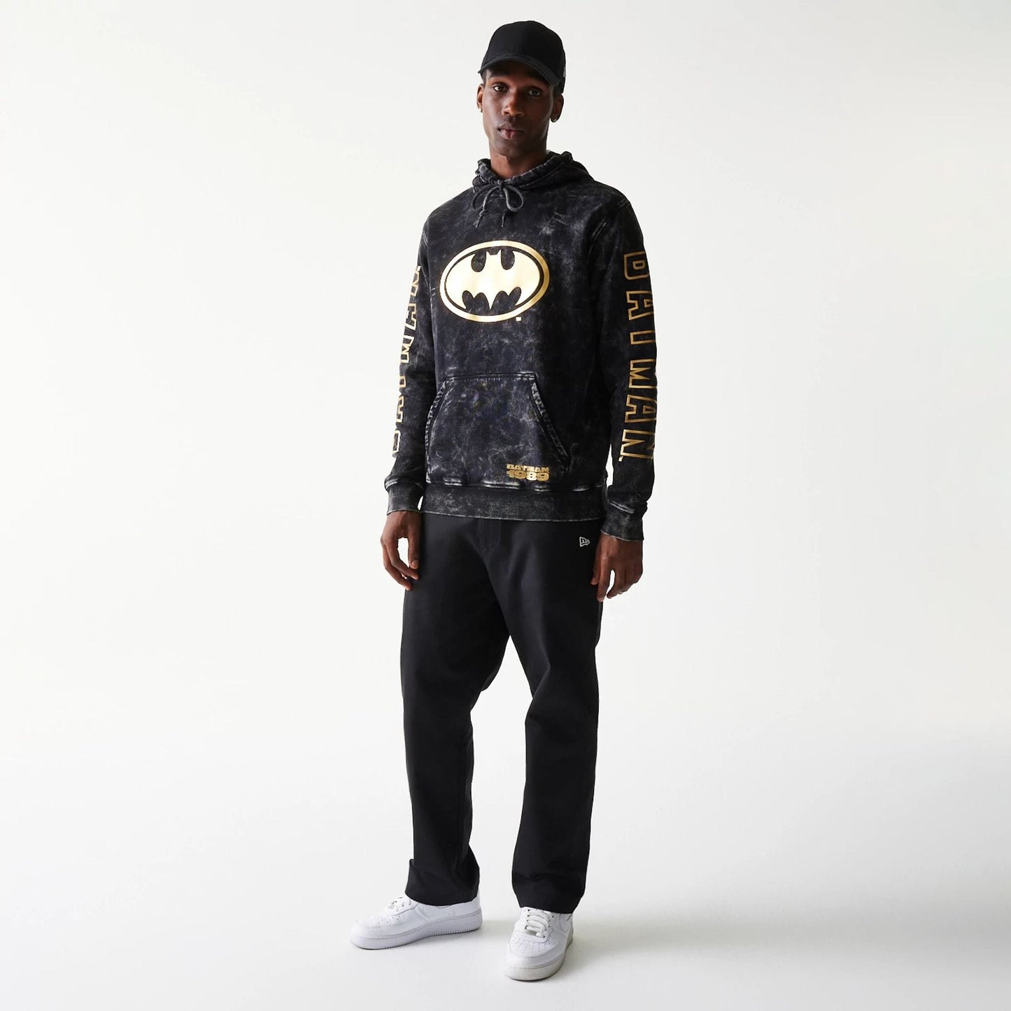 The Male model is wearing Batman 1989 Black Pullover Hoodie 8