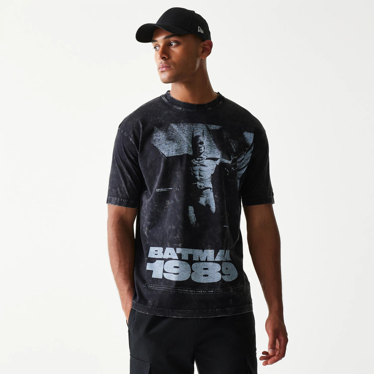 The Male model is wearing Batman 1989 Black T-Shirt 1