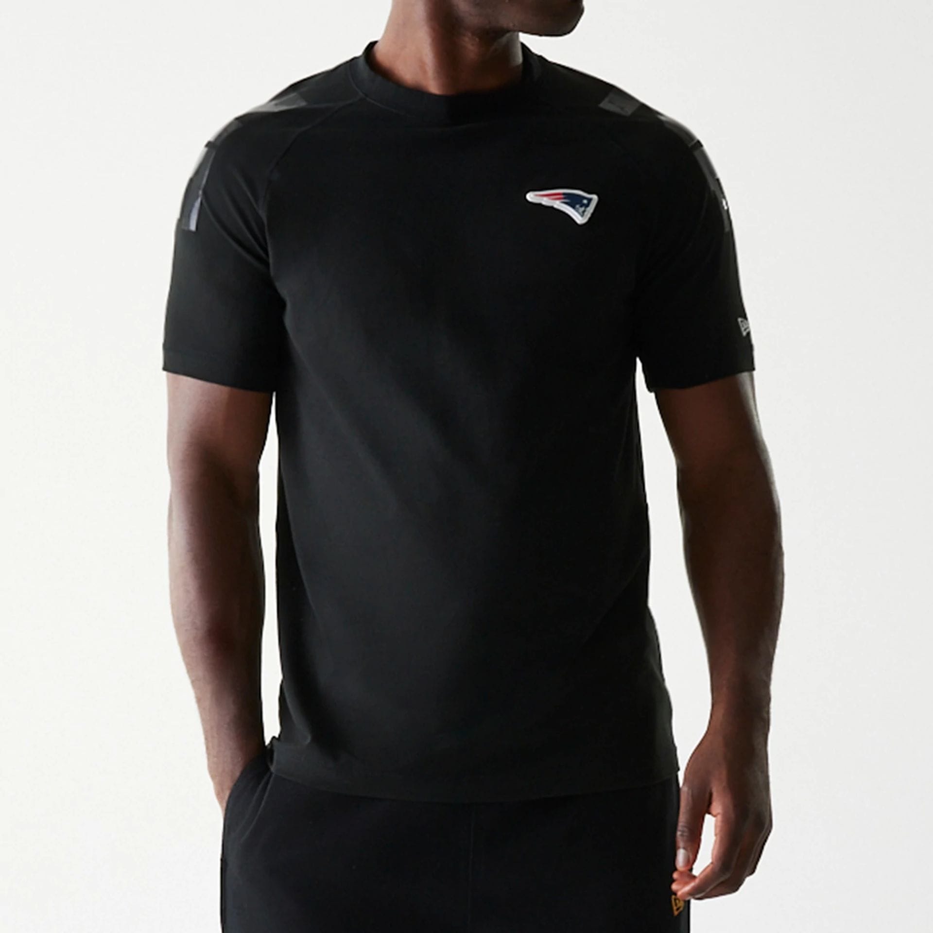 The Male model is wearing New England Patriots NFL 3RD Down Black T-Shirt 1