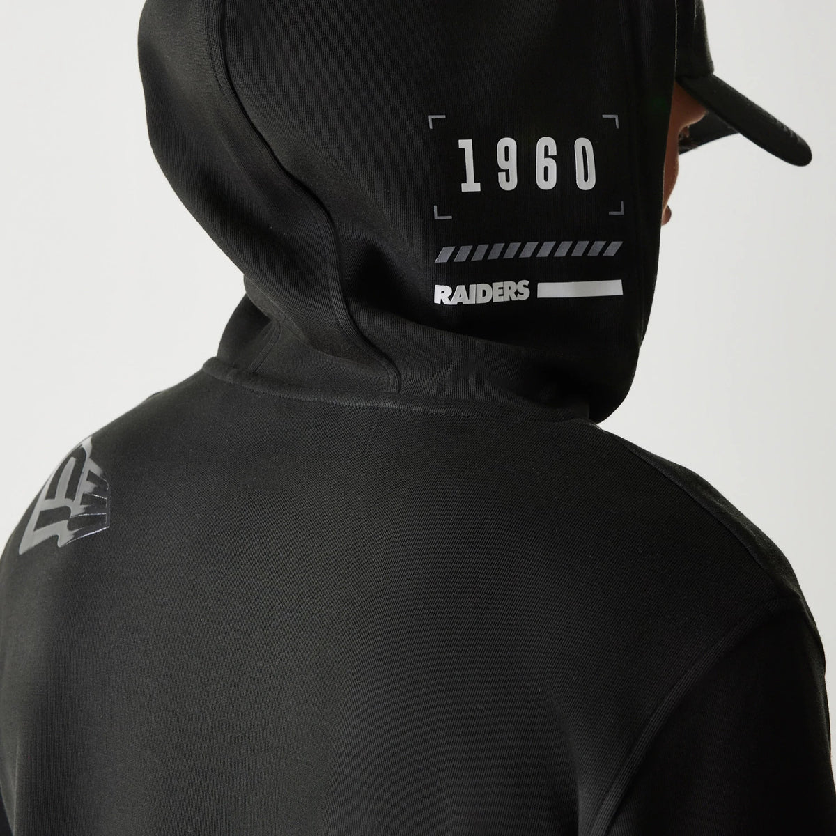 The Male model is wearing Las Vegas Raiders NFL 3RD Down Black Pullover Hoodie 3