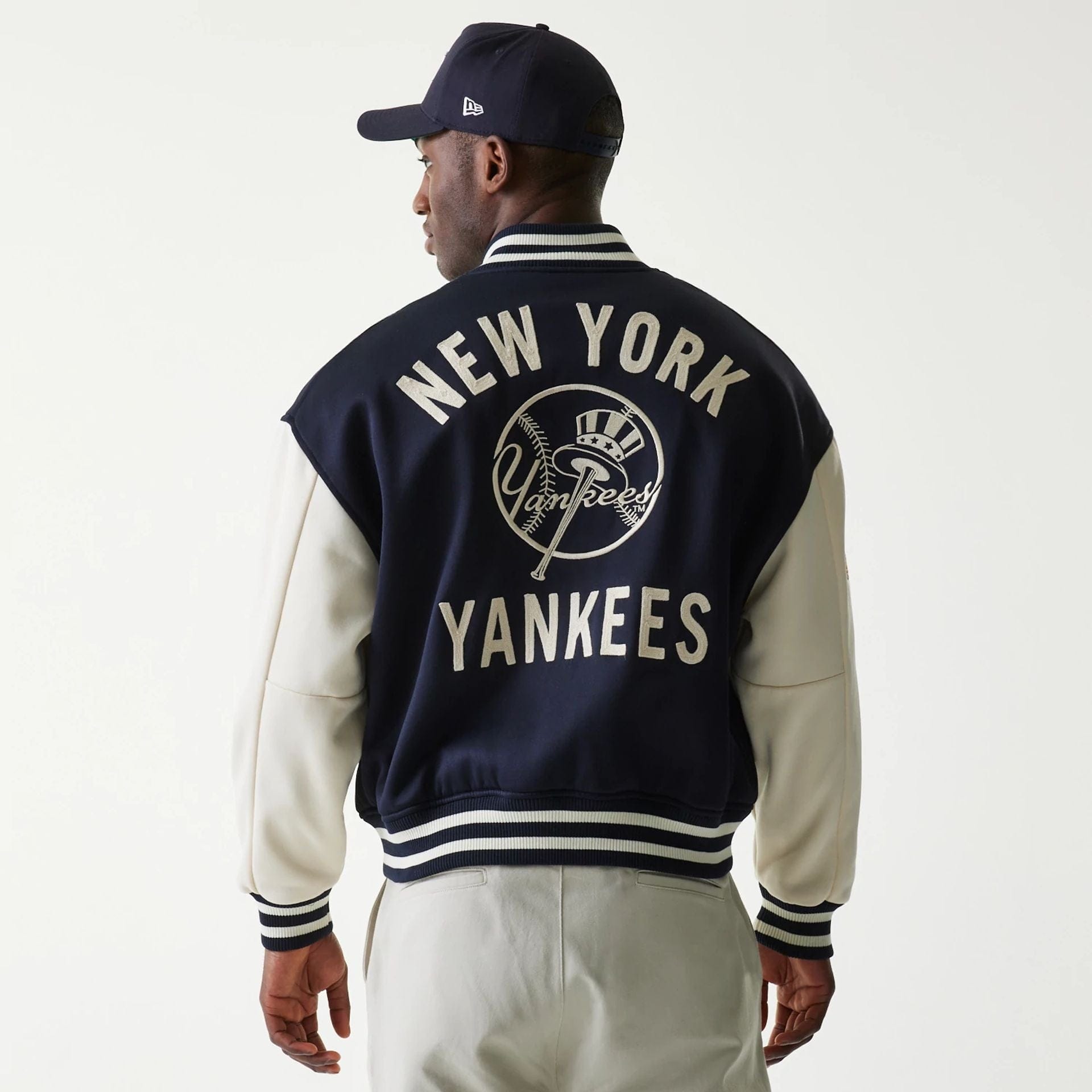 The Male model is wearing New York Yankees MLB Jersey Navy Bomber Jacket 2