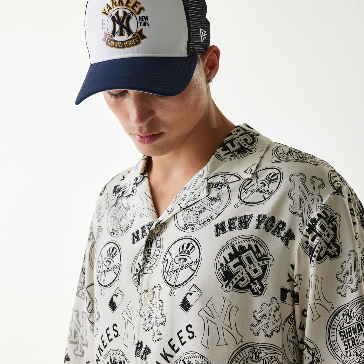 The Male model is wearing MLB Subway Series All Over Print Open White Short Sleeve Shirt 3