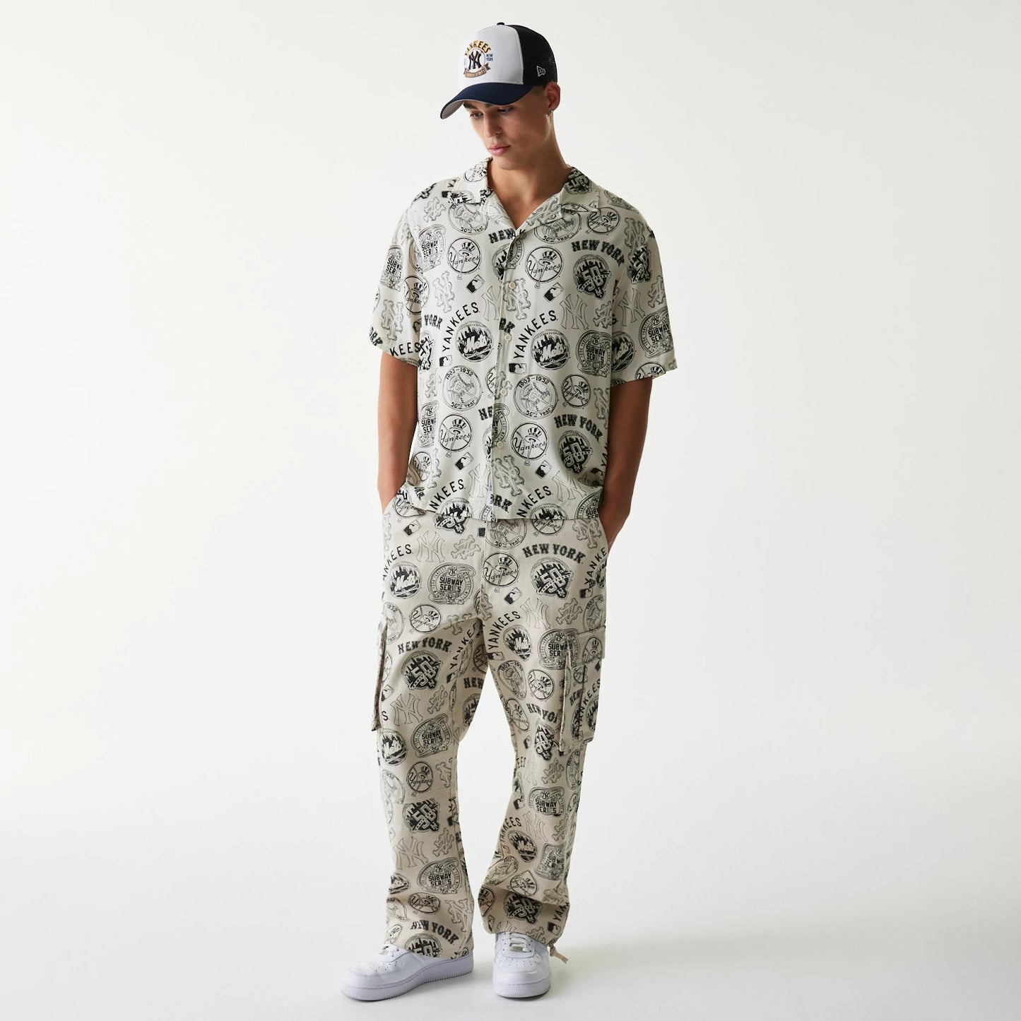 The Male model is wearing MLB Subway Series All Over Print Open White Short Sleeve Shirt 8