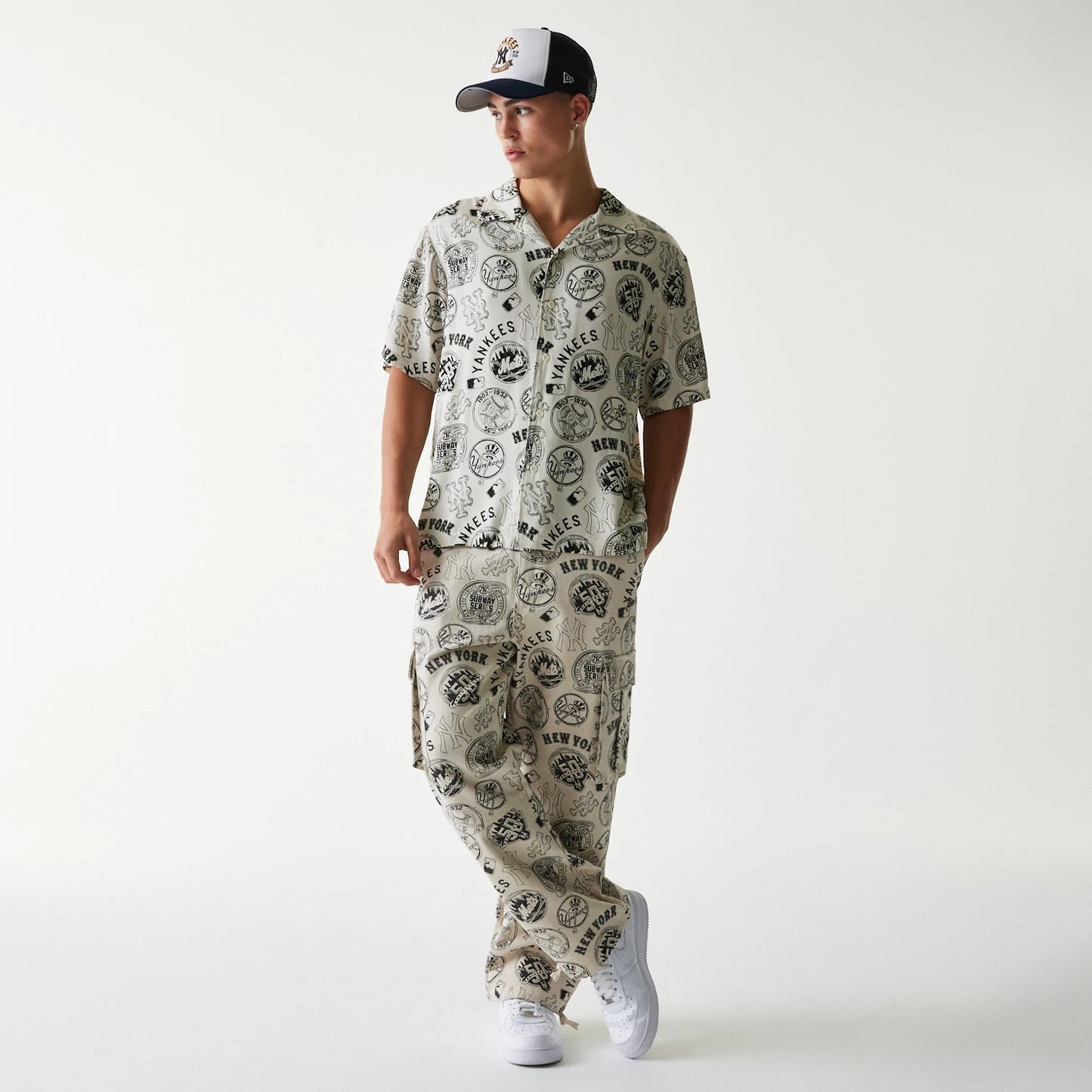 The Male model is wearing MLB Subway Series All Over Print Cargo Trousers 8