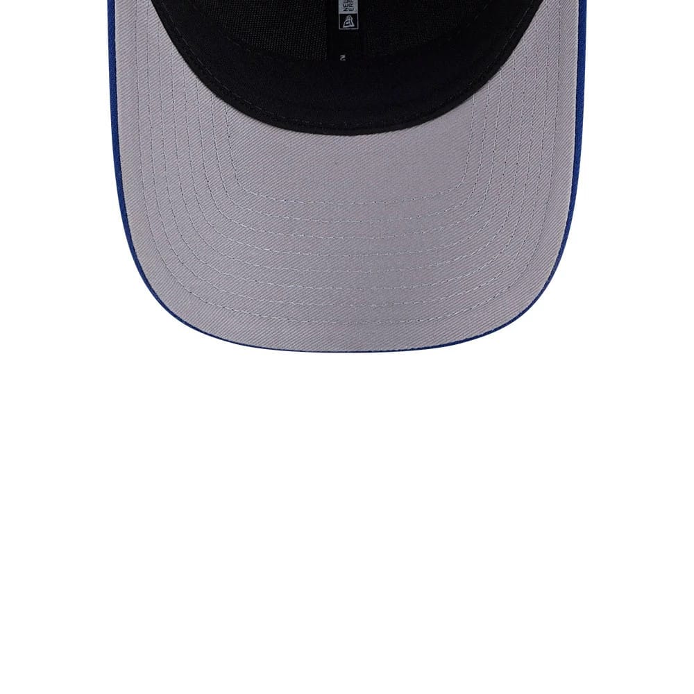 Vancouver Canucks NHL Team Blue New Era 9FORTY M-Crown Adjustable Cap, inside view showing the grey undervisor with detailed stitching, black interior sweatband, and New Era branded taping along the seams.
