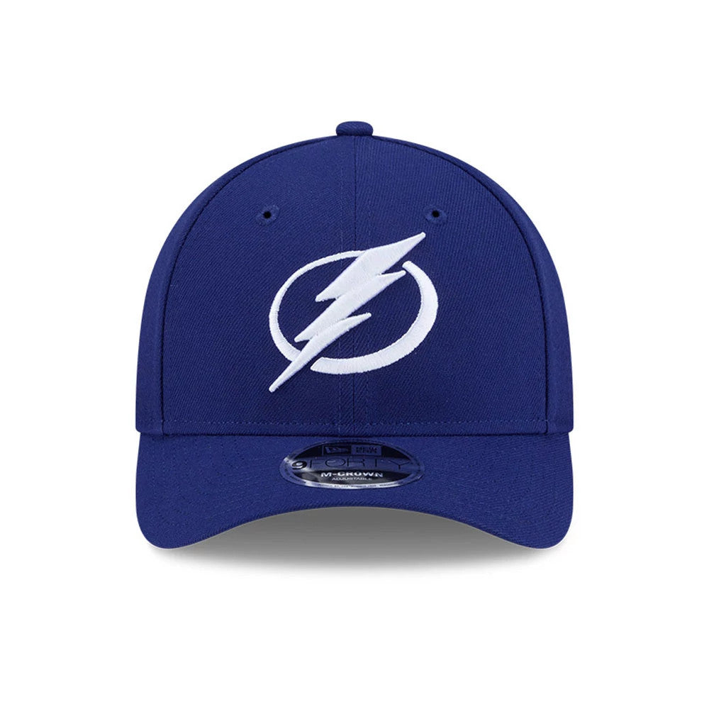 Tampa Bay Lightning NHL Team Blue New Era 9FORTY M-Crown Adjustable Cap, front view showing the raised white embroidered lightning bolt logo on the structured blue crown, with a curved visor and a 9FORTY size sticker.