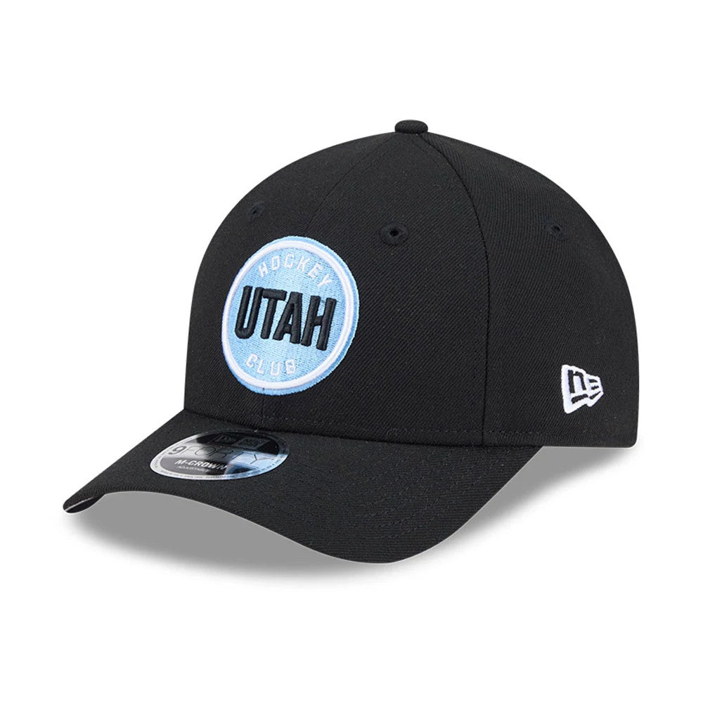 Utah Mammoth NHL Team Black New Era 9FORTY M-Crown Adjustable Cap, three-quarter view showing a light blue and white embroidered Utah Hockey Club logo on the front panel, black curved visor with a 9FORTY size sticker.