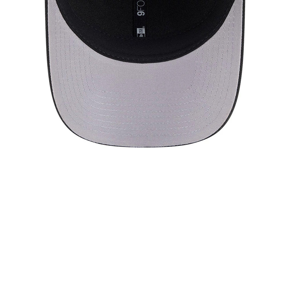 California Golden Seals NHL Team Black New Era 9FORTY M-Crown Adjustable Cap, inside view showing the light grey undervisor and the black sweatband with a 9FORTY size sticker and detailed stitching lines.