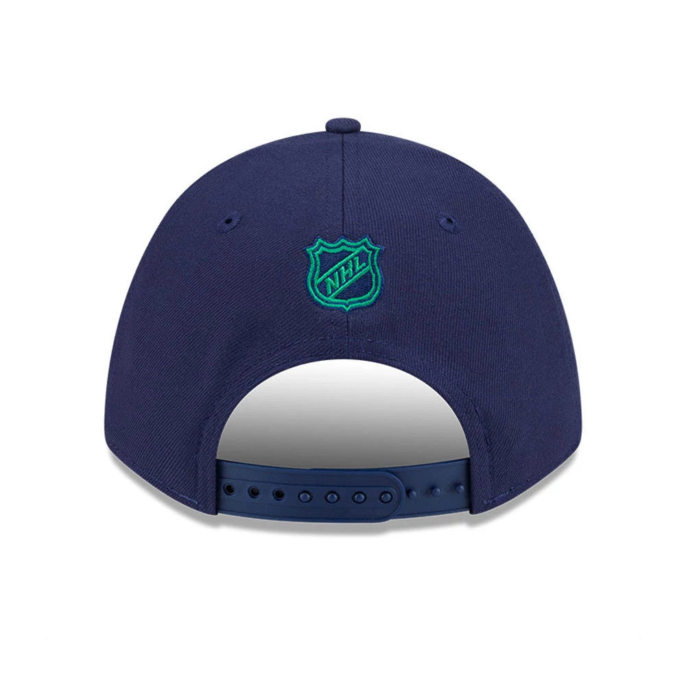 Hartford Whalers NHL Team Navy New Era 9FORTY M-Crown Adjustable Cap, rear view showing the green embroidered NHL logo centred on the structured navy crown above a navy adjustable strap with snap closure.