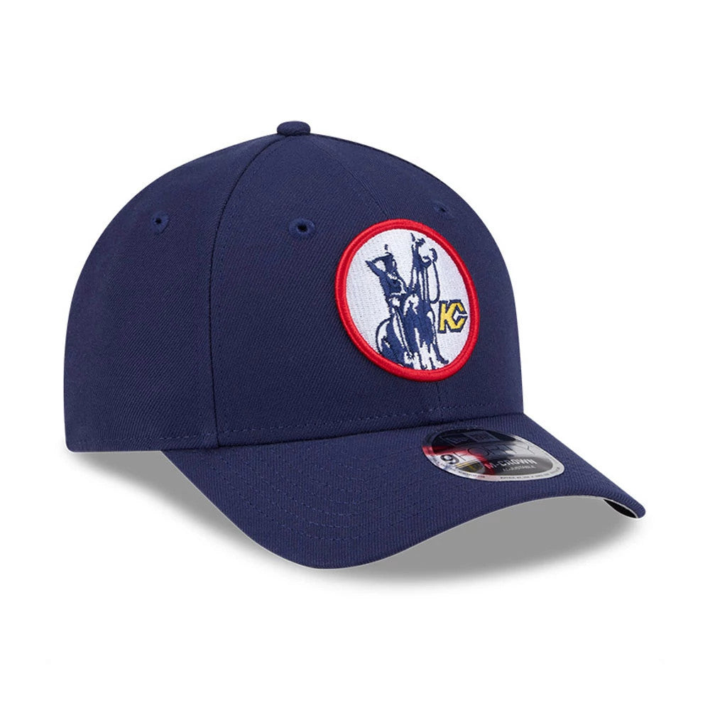 Kansas City Scouts NHL Team Navy New Era 9FORTY M-Crown Adjustable Cap, three-quarter view showing the embroidered Scouts logo on the front panel with a red border, paired with a curved visor and a 9FORTY size sticker on the visor.