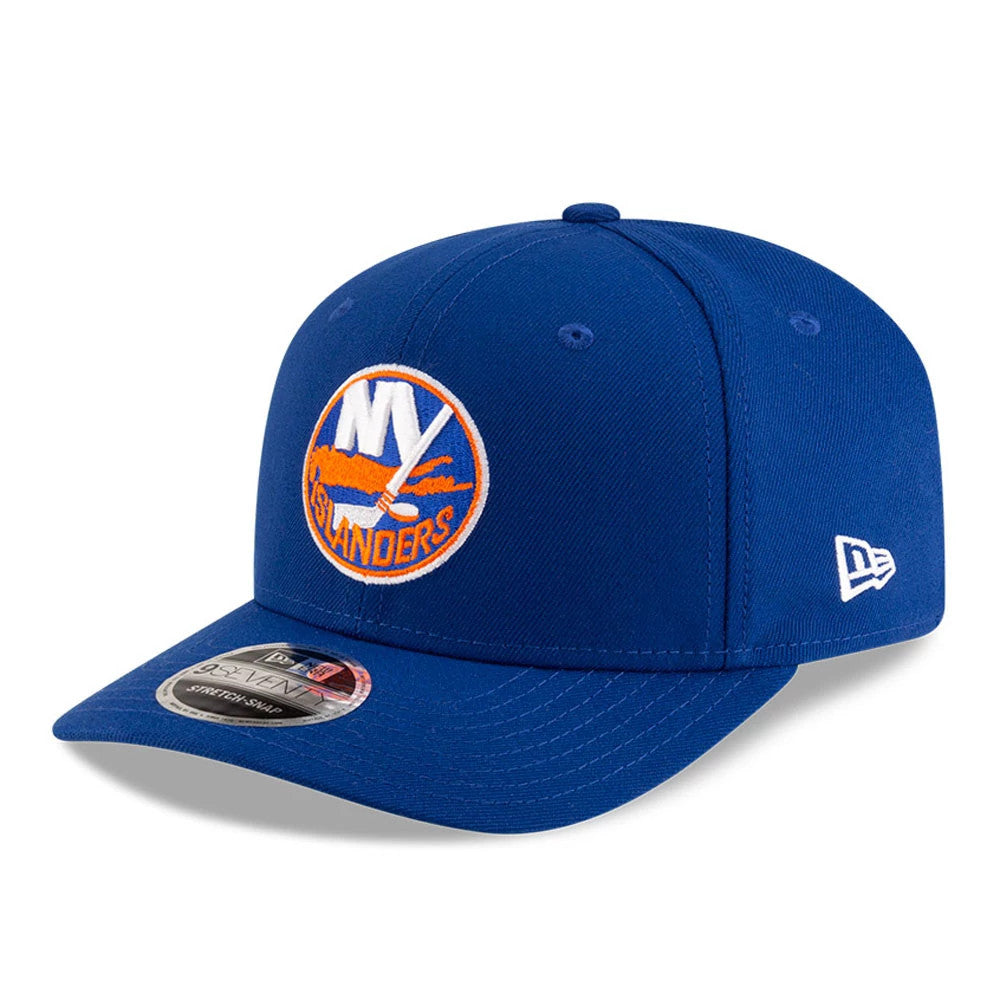New York Islanders NHL Team Blue New Era 9SEVENTY Stretch Snap Adjustable Cap, three-quarter view showing the raised orange and white Islanders logo on the front panel, blue curved visor with a 9SEVENTY size sticker.