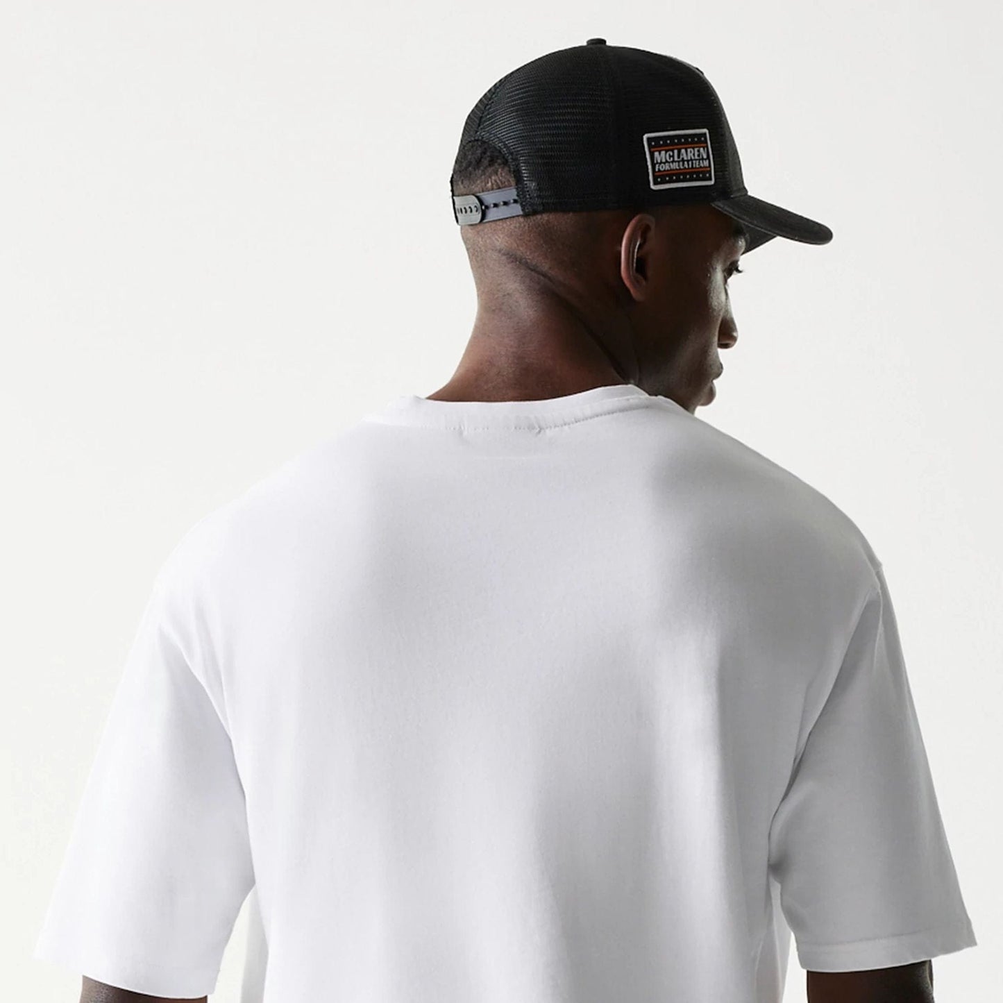 The Male model is wearing McLaren Racing Wordmark White Oversized T-Shirt 7