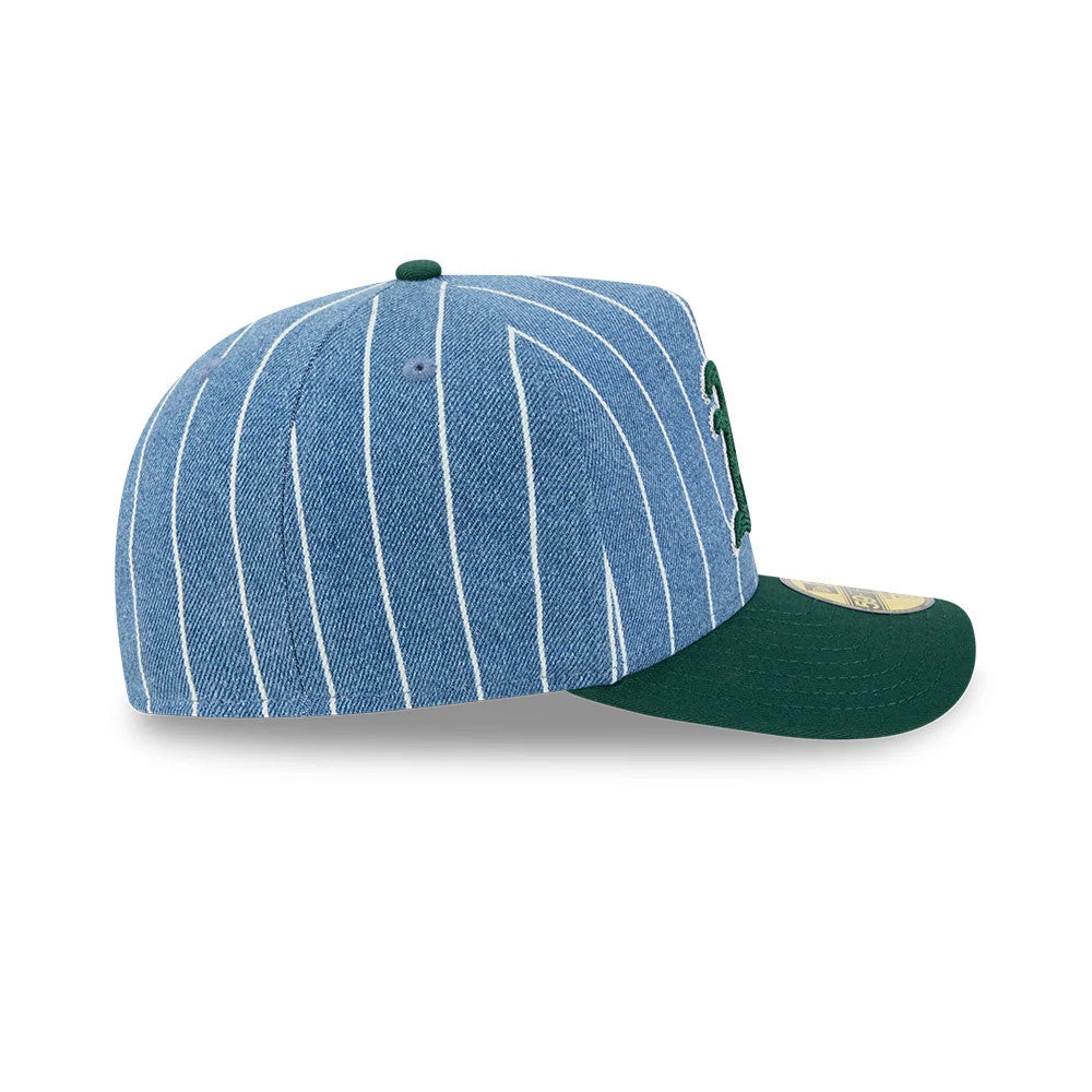 Athletics MLB Parallel Blue New Era 59FIFTY A-Frame Fitted Cap, side view showing vertical white pinstripes on the blue structured crown, a green New Era flag logo on the left side, and a contrasting green flat visor.