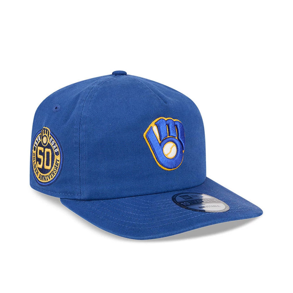 Milwaukee Brewers MLB Championship Blue New Era 19TWENTY Adjustable Cap, three-quarter view showing a blue visor with a 19TWENTY size sticker, a raised yellow and white logo on the front panel and an embroidered 50th anniversary side patch.