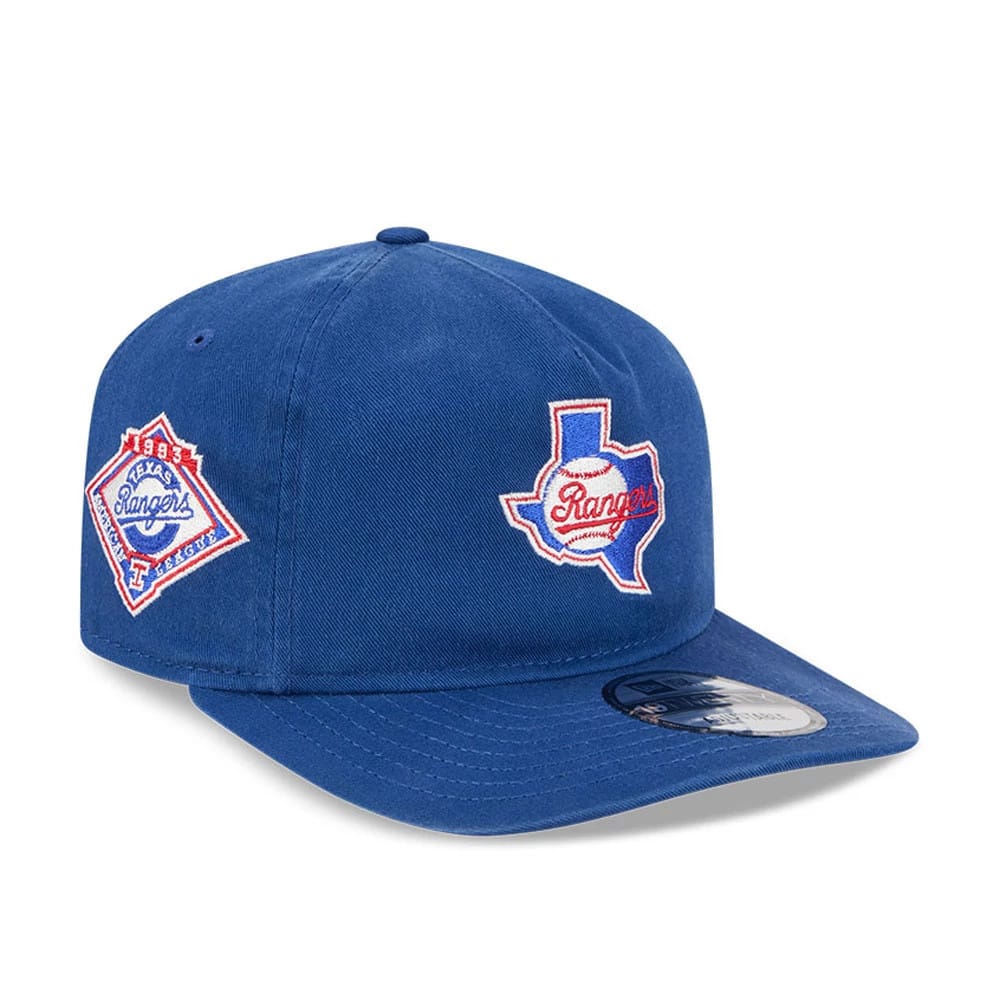 Texas Rangers MLB Championship Blue New Era 19TWENTY Adjustable Cap, three-quarter view showing a white embroidered Texas and Rangers logo on the front panel, with a blue flat visor and a 19TWENTY size sticker on the visor.