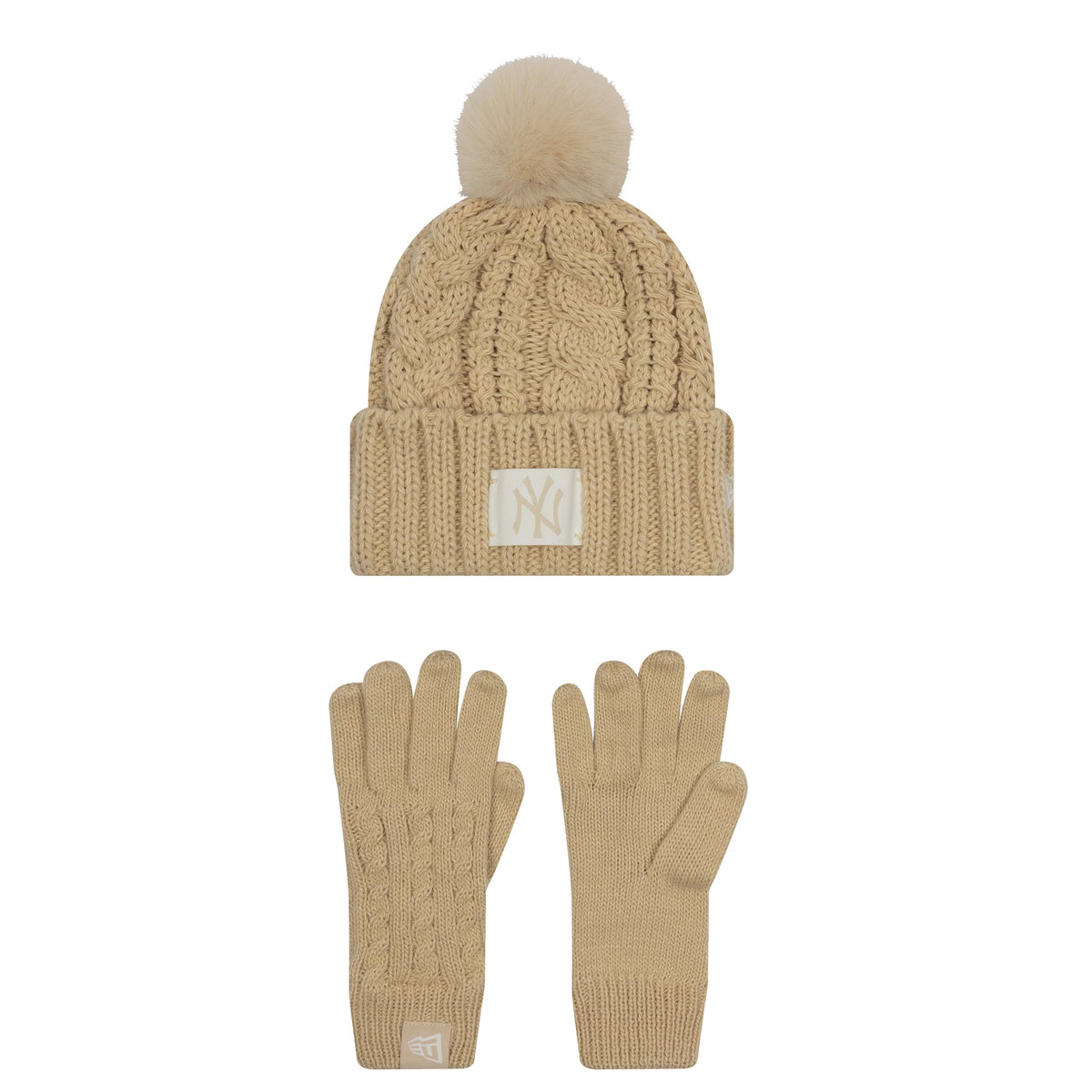 New Era New York Yankees Youth MLB Beige Beanie & Gloves Set, front view showing a cable-knit beanie with a prominent beige NY logo on the cuff and a fluffy pom-pom on top, paired with matching beige gloves featuring a logo tab.