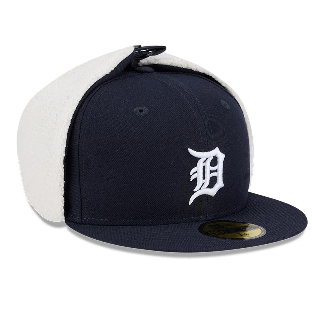 Detroit Tigers MLB Classic Navy Dogear New Era 59FIFTY Fitted Cap, three-quarter view showing raised white embroidered D logo on front panel, with cream fleece-lined earflaps up, navy flat visor and gold 59FIFTY size sticker.