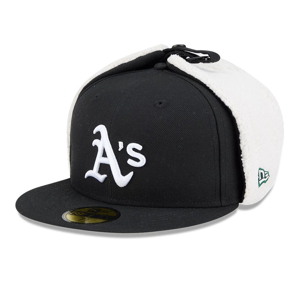 Athletics MLB Classic Black Dogear New Era 59FIFTY Fitted Cap, three-quarter view with the white embroidered A logo on black front panels, black visor with gold 59FIFTY size sticker, and white fleece dogear flaps.