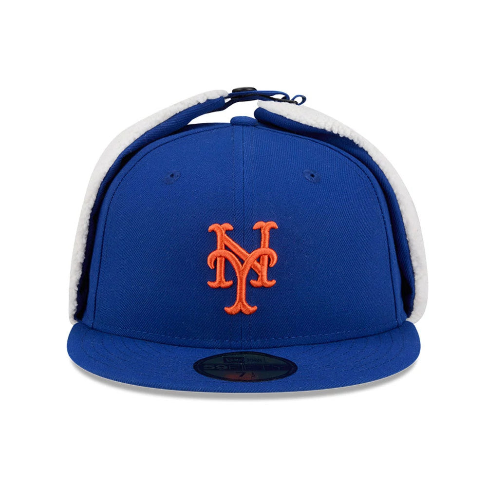 New York Mets MLB Classic Blue Dogear New Era 59FIFTY Fitted Cap, front view showing the raised orange Mets logo embroidered on the structured blue crown, with dogear flaps lined in white and a blue flat visor with a size sticker.