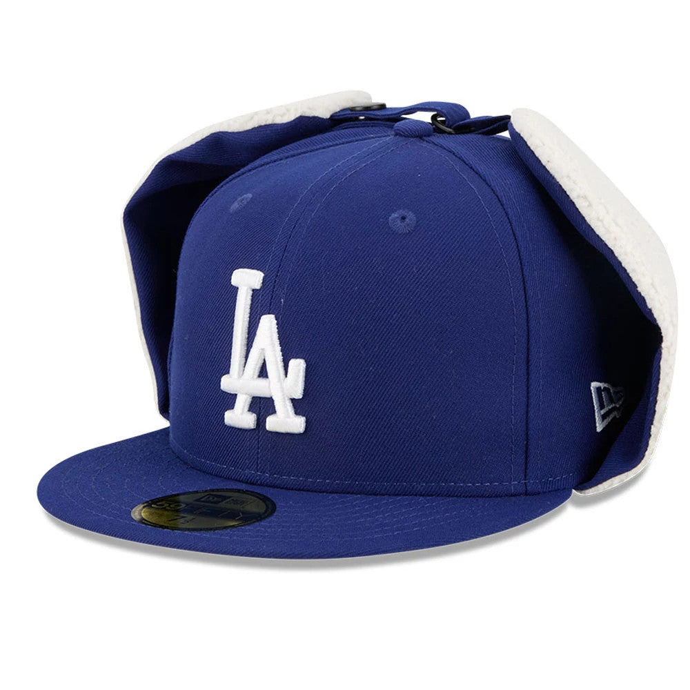 LA Dodgers MLB Classic Dark Blue Dogear New Era 59FIFTY Fitted Cap, three-quarter view showing raised white embroidered LA logo on the front panel, dark blue visor with gold 59FIFTY size sticker, and New Era flag logo on the left side.