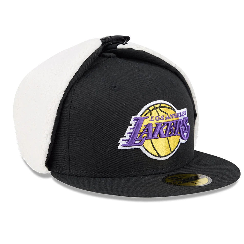 LA Lakers NBA Classic Black Dogear New Era 59FIFTY Fitted Cap, three-quarter view showing the raised purple and gold embroidered Lakers logo on the front panel, with fleece-lined dogear flaps and a black flat visor with a gold 59FIFTY size sticker.