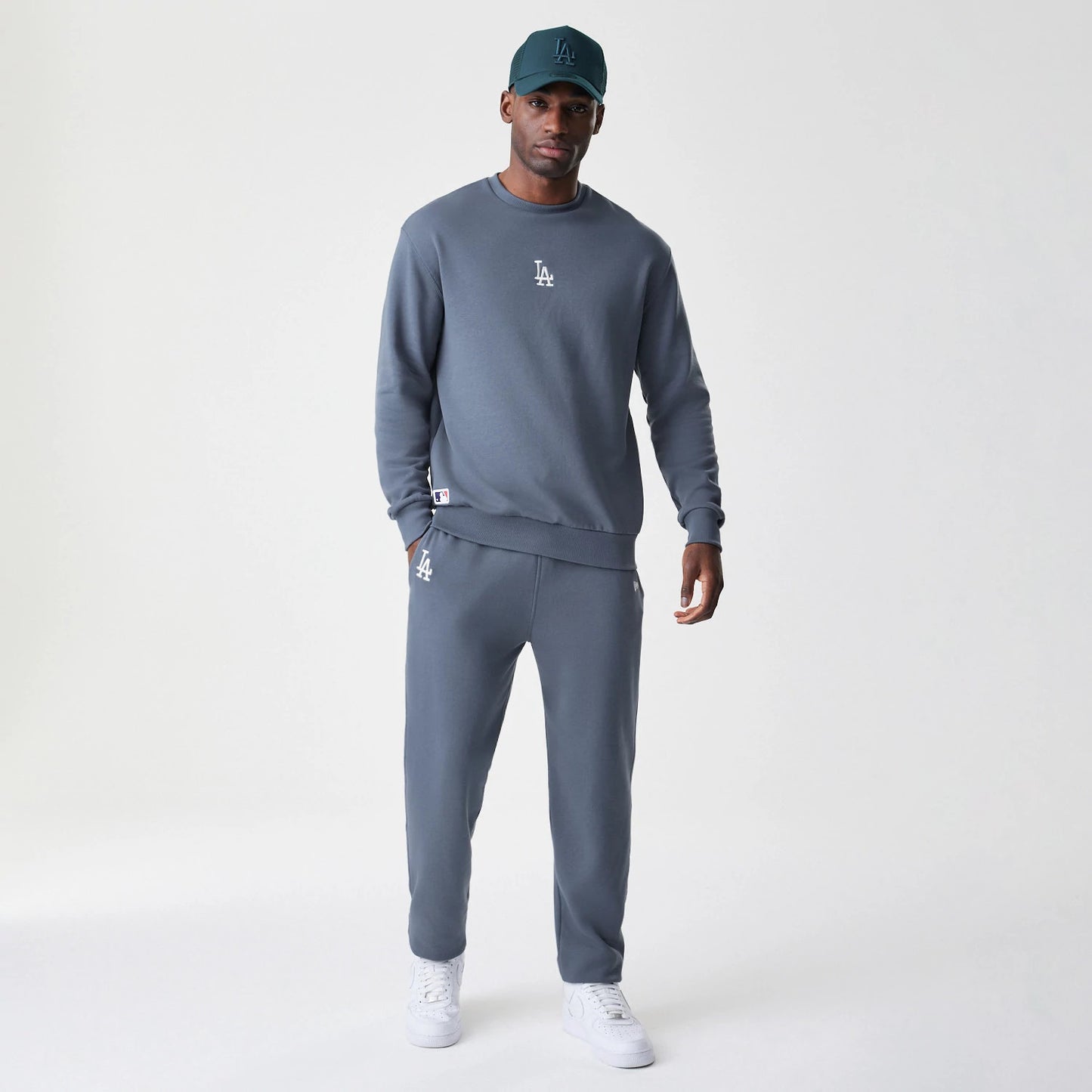 The Male model is wearing LA Dodgers MLB Midi League Essential Dark Grey Oversized Crew Neck Sweater 8