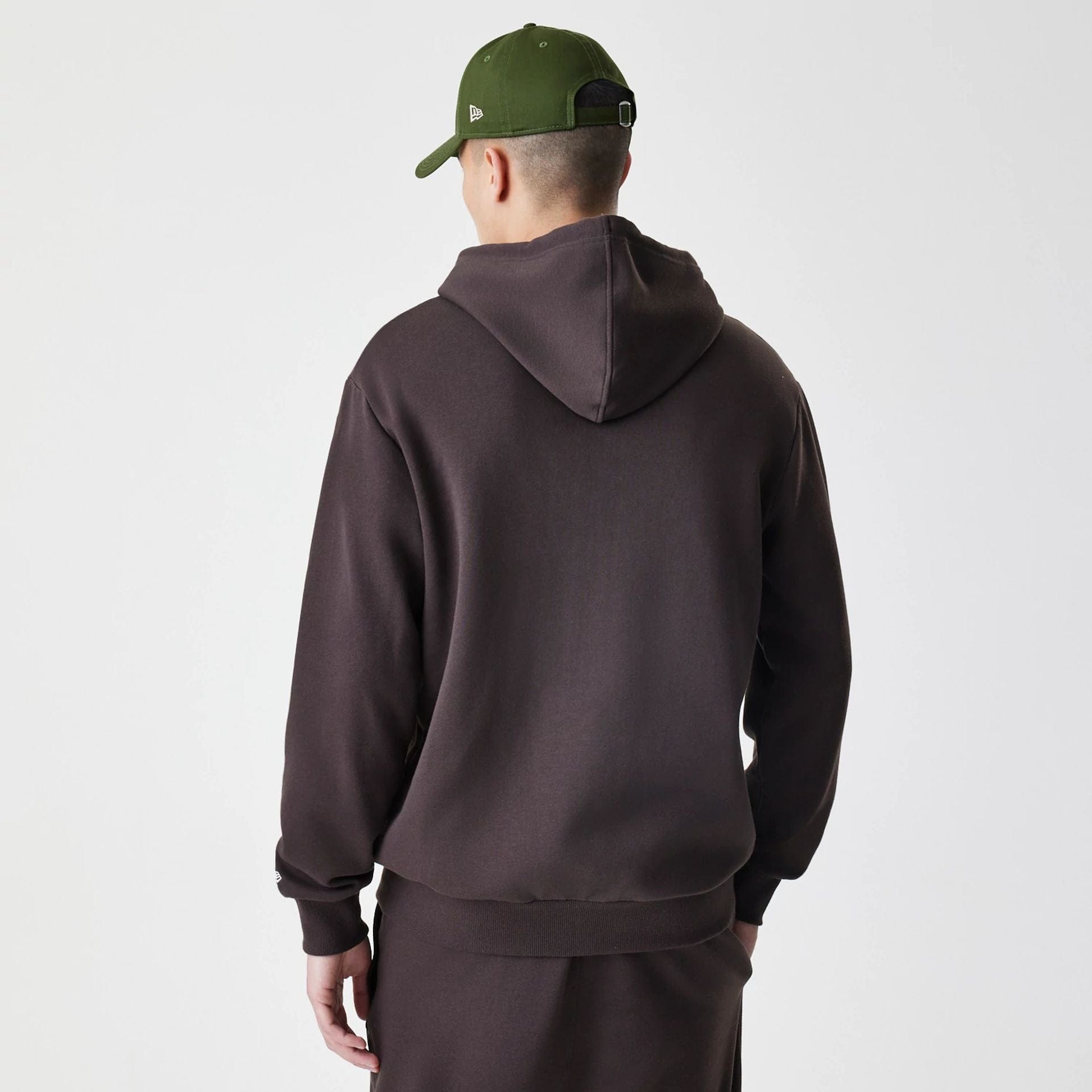 The Male model is wearing New York Yankees MLB Midi League Essential Dark Brown Full Zip Hoodie 2