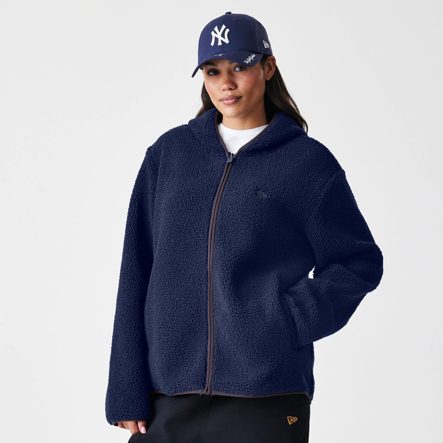 The Male model is wearing New Era Navy Hooded Sherpa Jacket 4