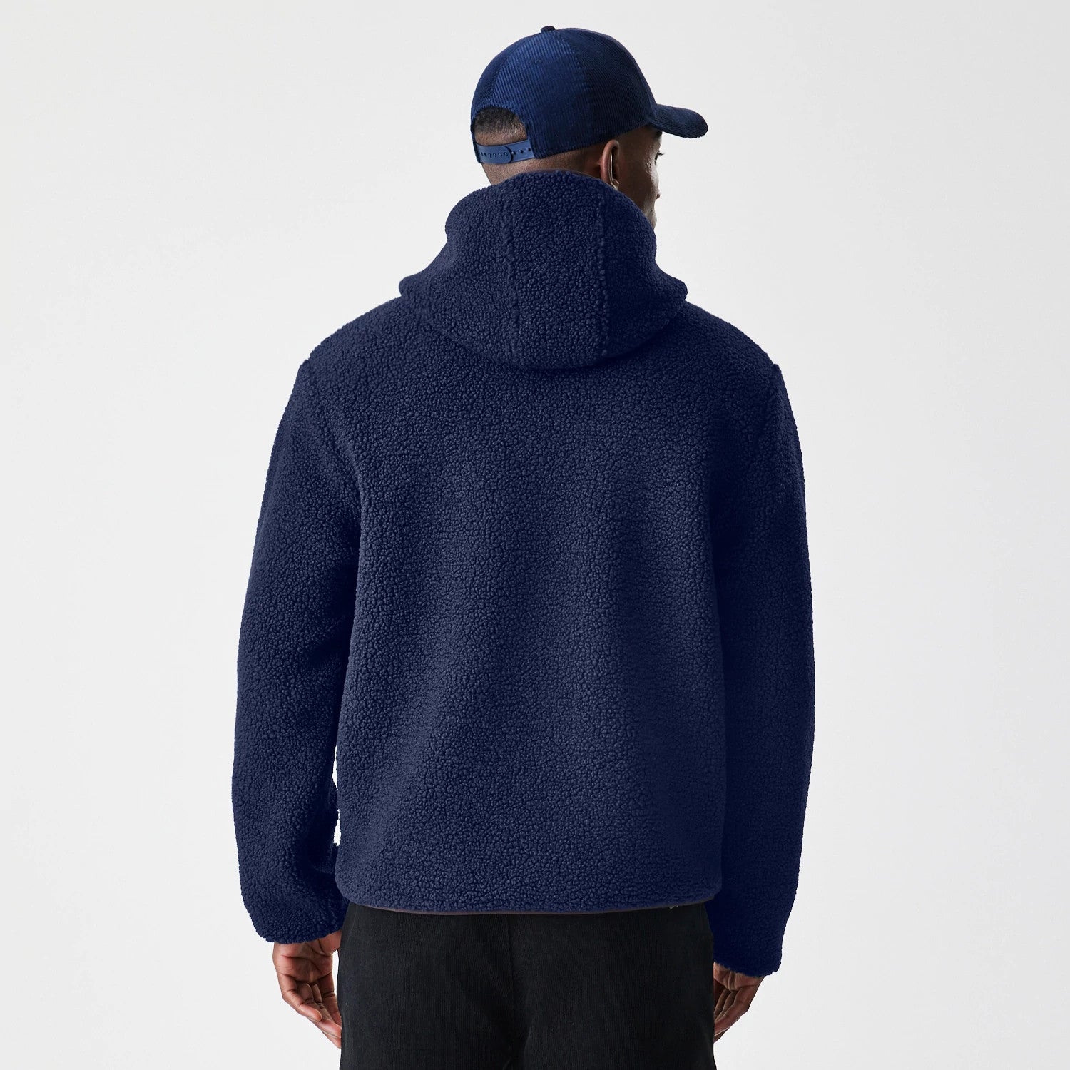 The Male model is wearing New Era Navy Hooded Sherpa Jacket 2