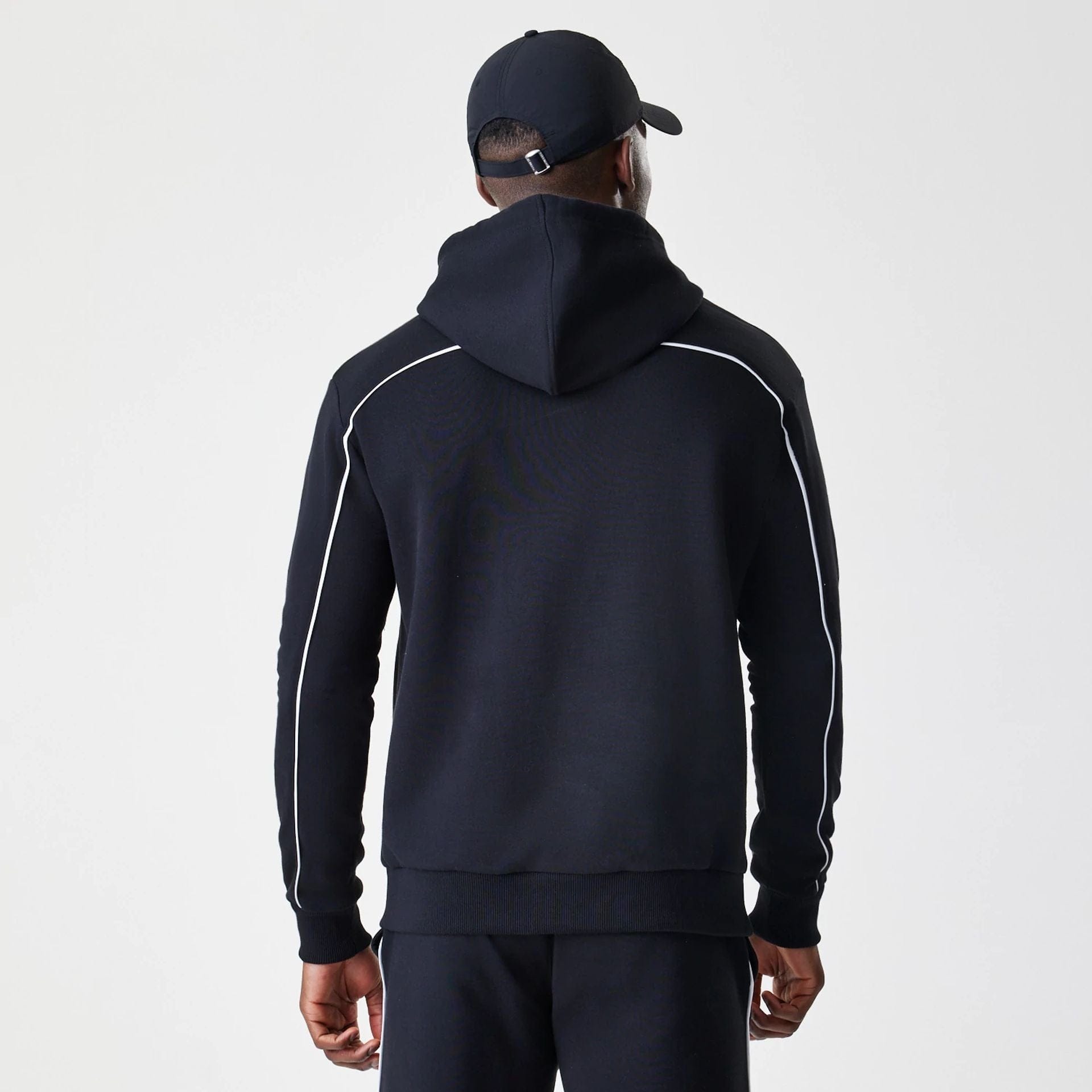 The Male model is wearing Chicago Bulls NBA Piping Black Oversized Pullover Hoodie 2