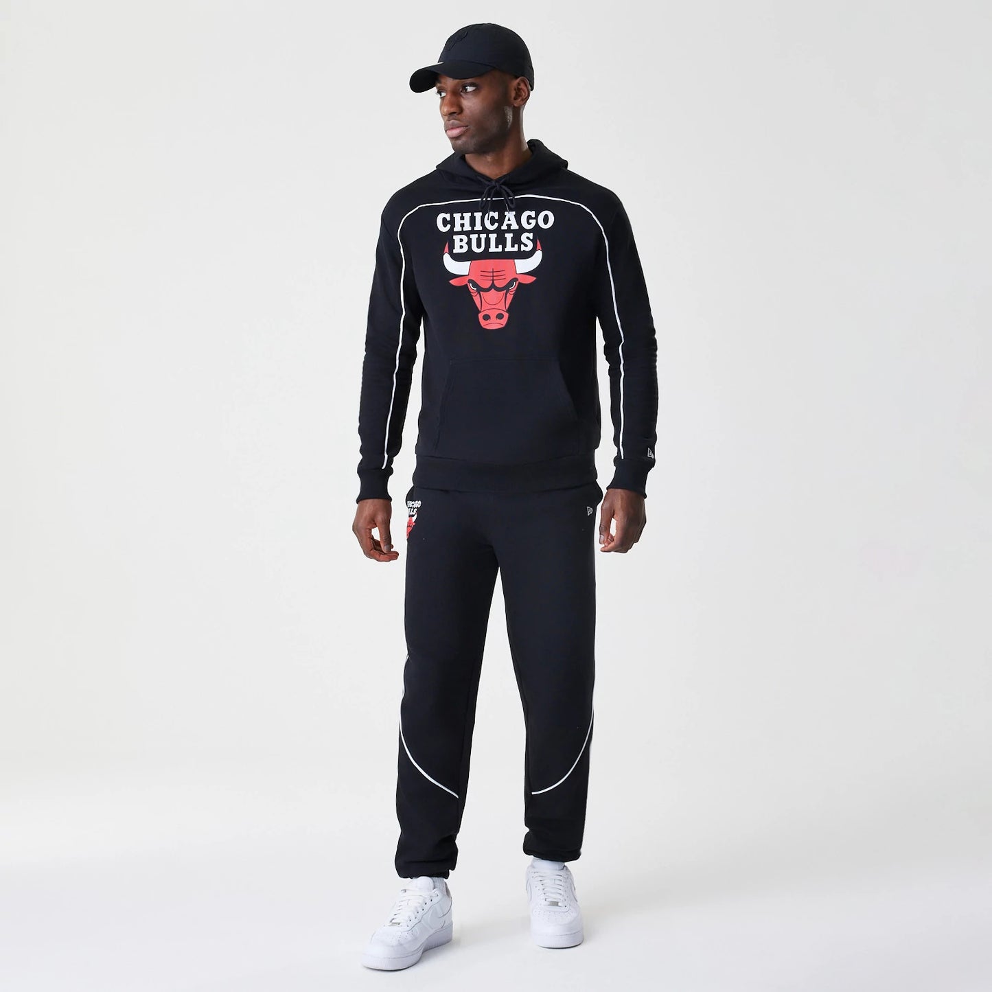 The Male model is wearing Chicago Bulls NBA Piping Black Oversized Pullover Hoodie 8