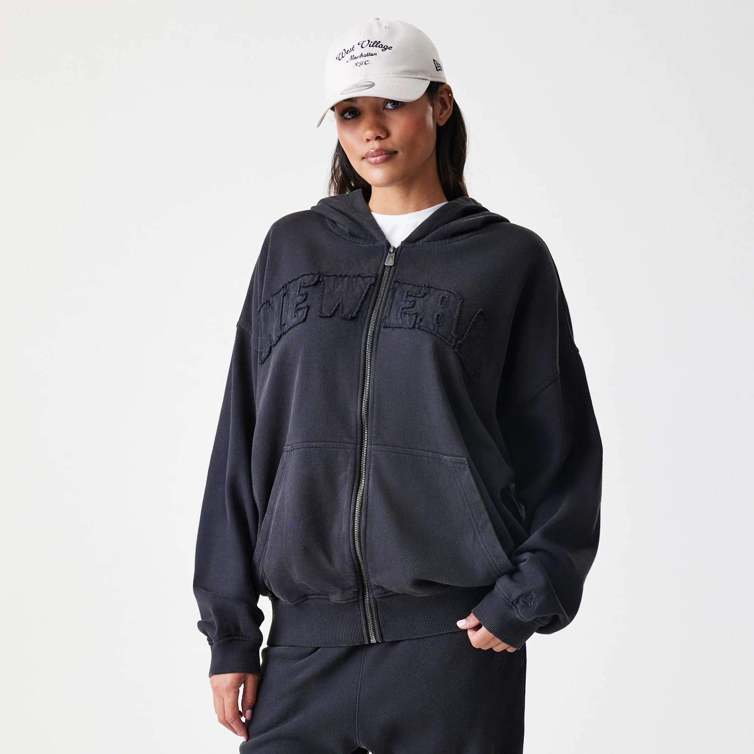 The Male model is wearing New Era Washed Black Oversized Full Zip Hoodie 4
