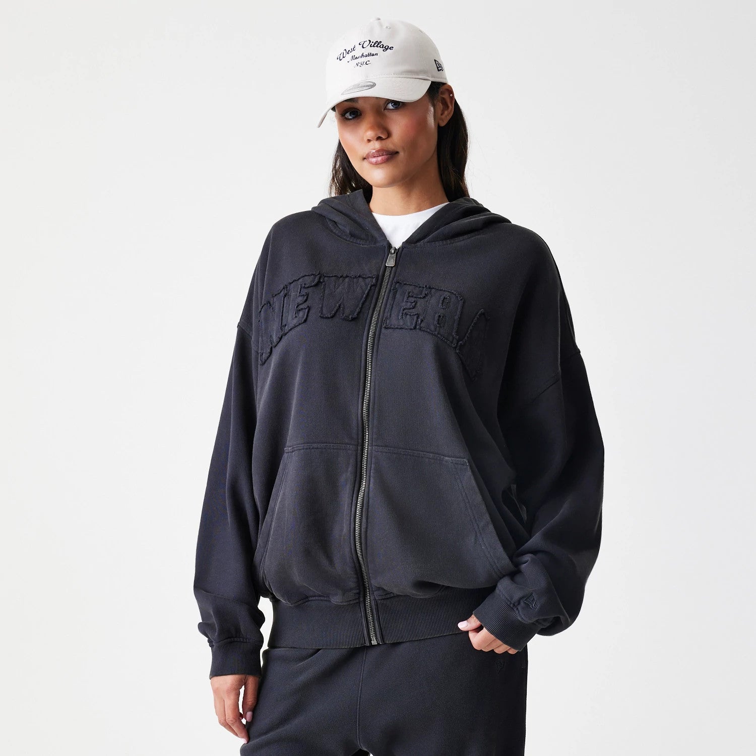 The Male model is wearing New Era Washed Black Oversized Full Zip Hoodie 4