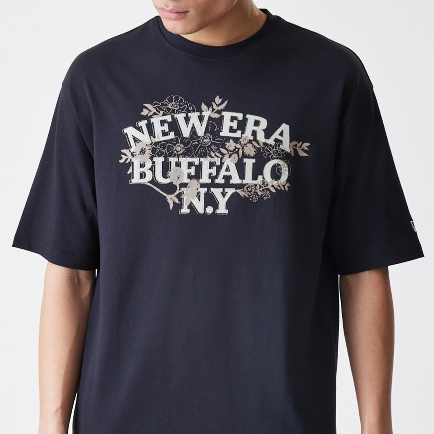The Male model is wearing New Era Floral Black Oversized T-Shirt 3