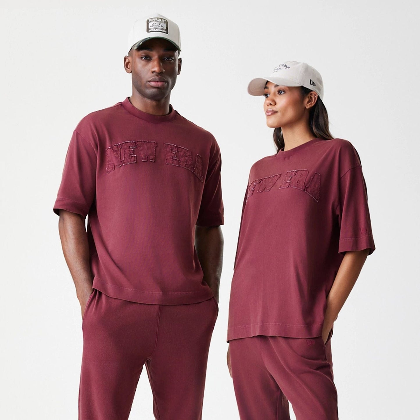 The Male model is wearing New Era Washed Dark Red Oversized T-Shirt 8