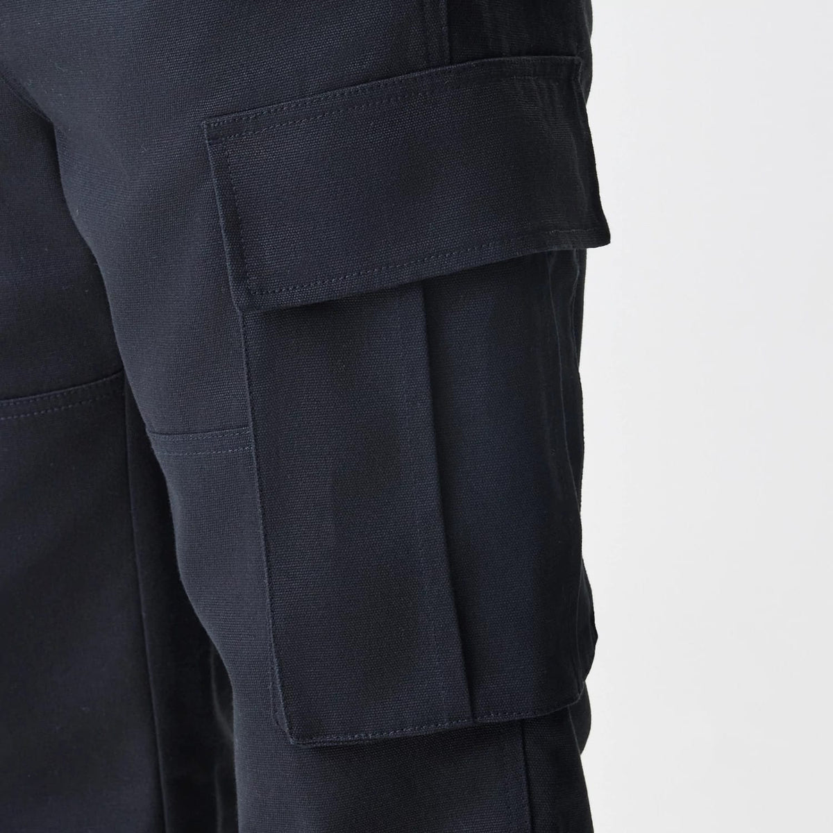 The Male model is wearing New Era Cargo Black Straight Leg Trousers 4