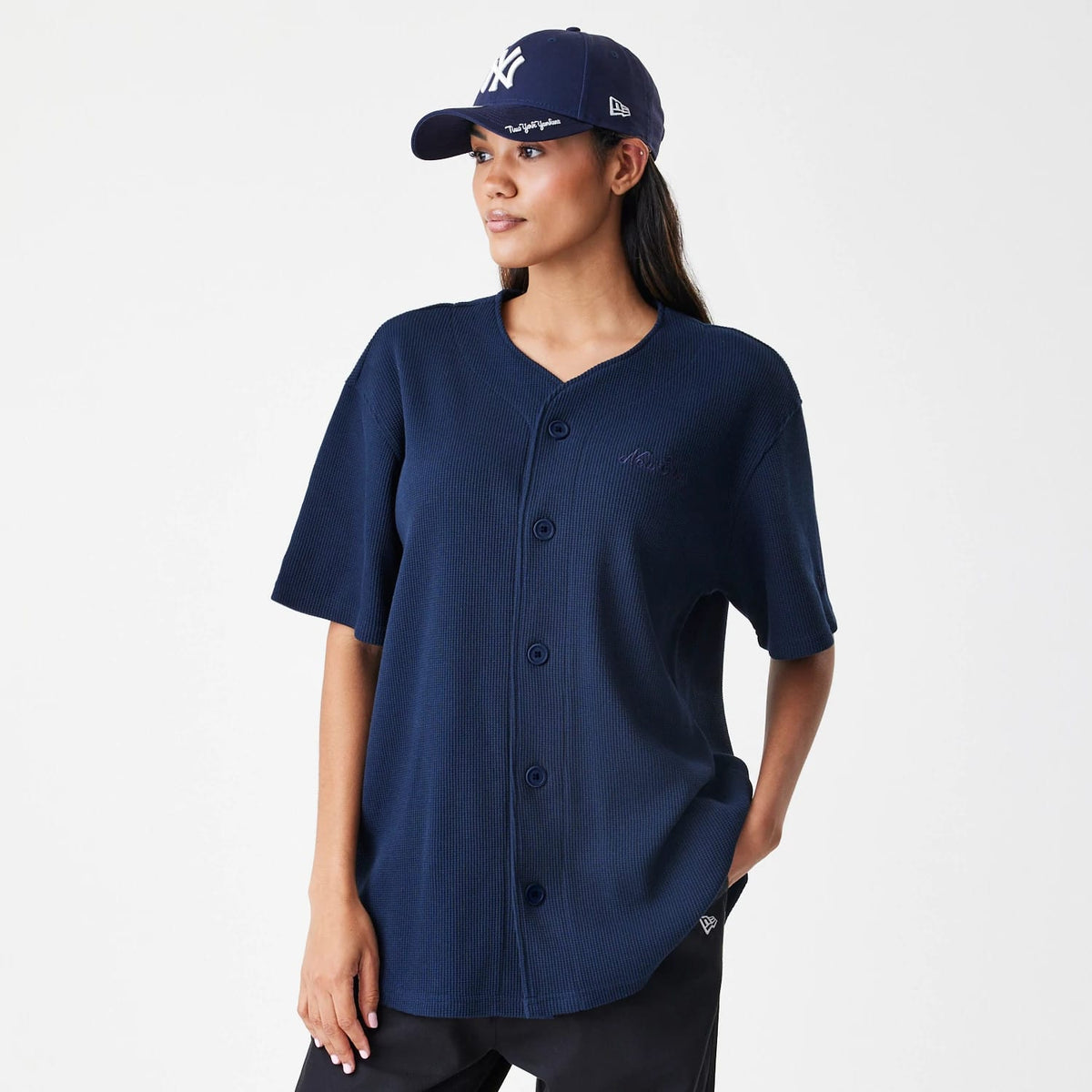 The Male model is wearing New Era Waffle Navy Jersey 4