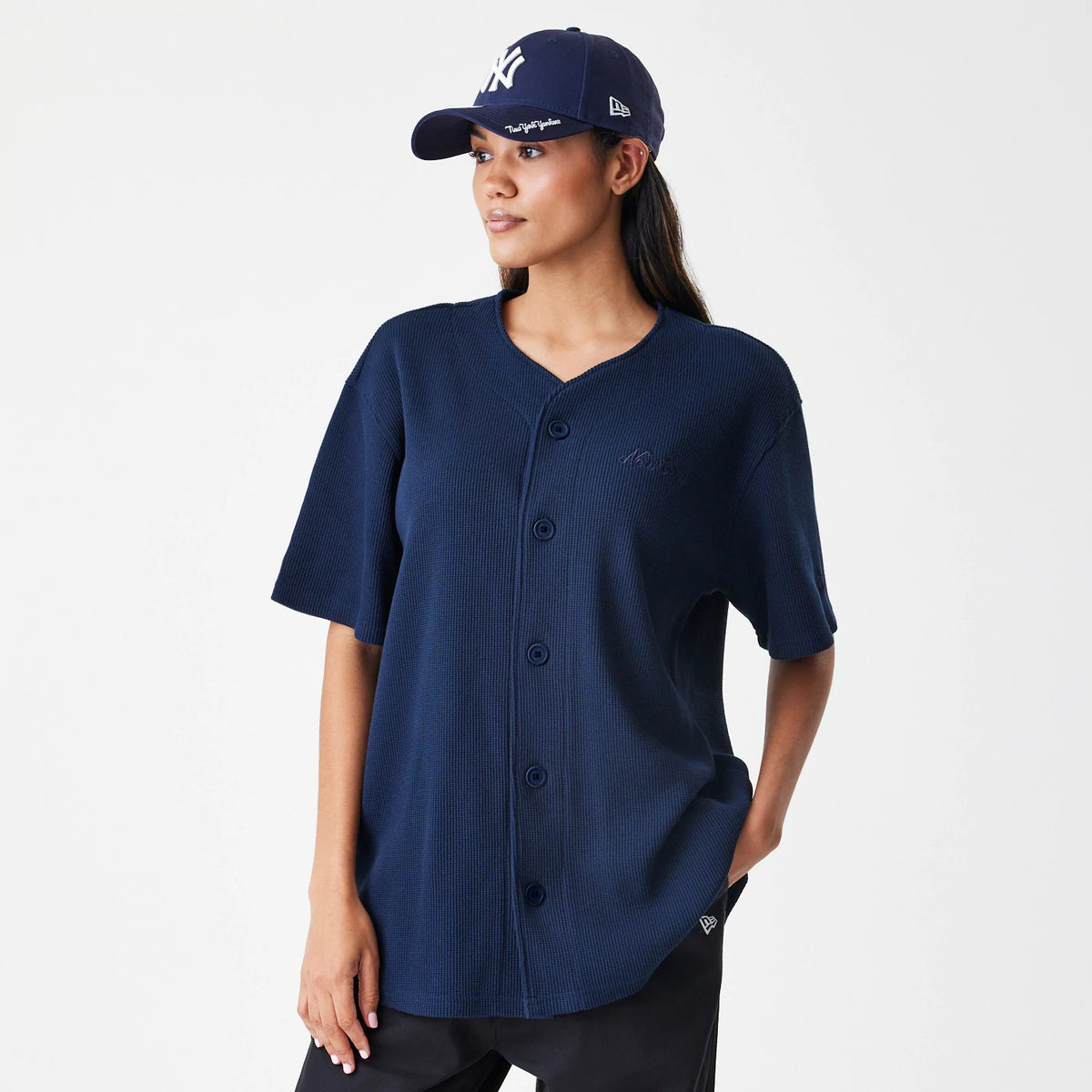 The Male model is wearing New Era Waffle Navy Jersey 4