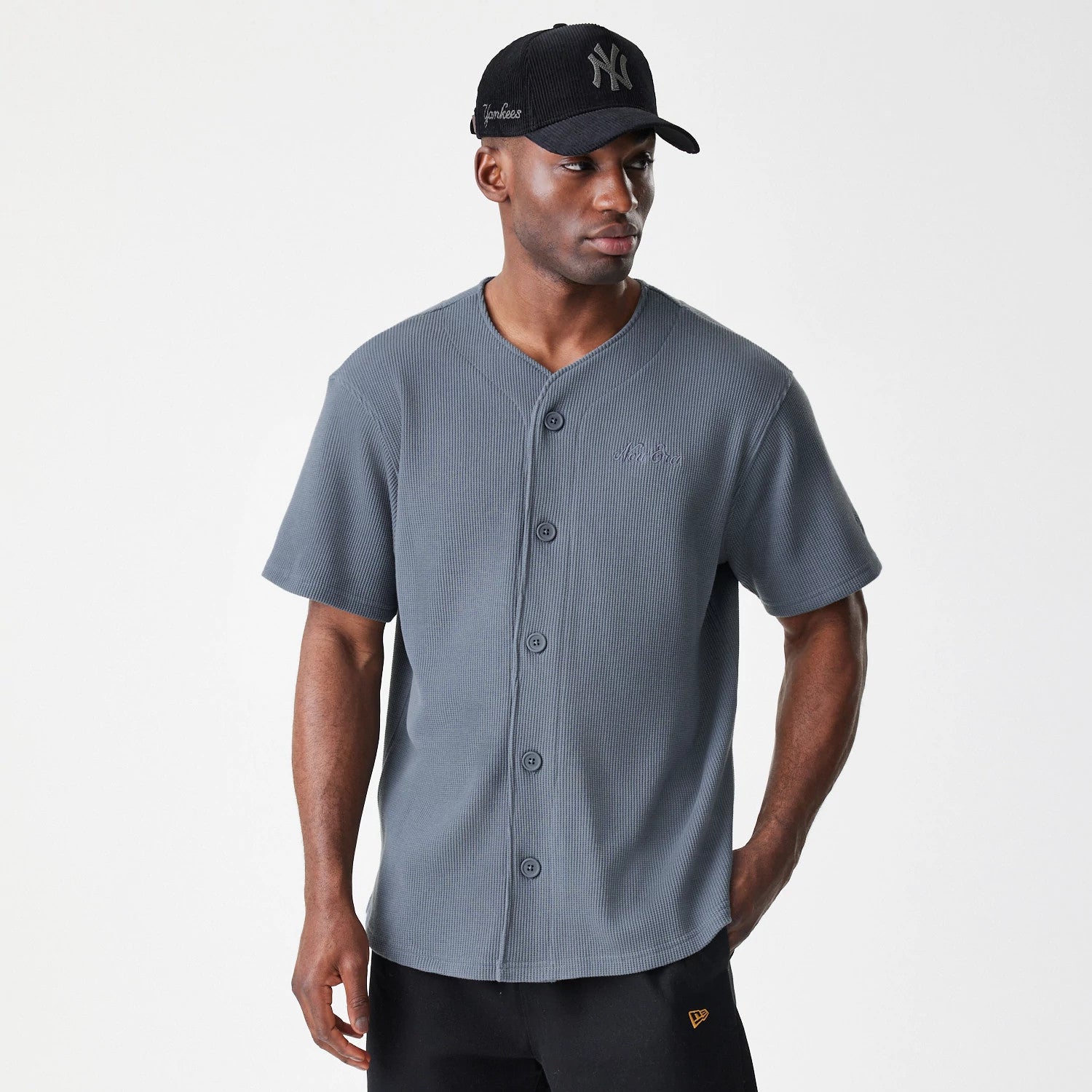 The Male model is wearing New Era Waffle Dark Grey Jersey 3