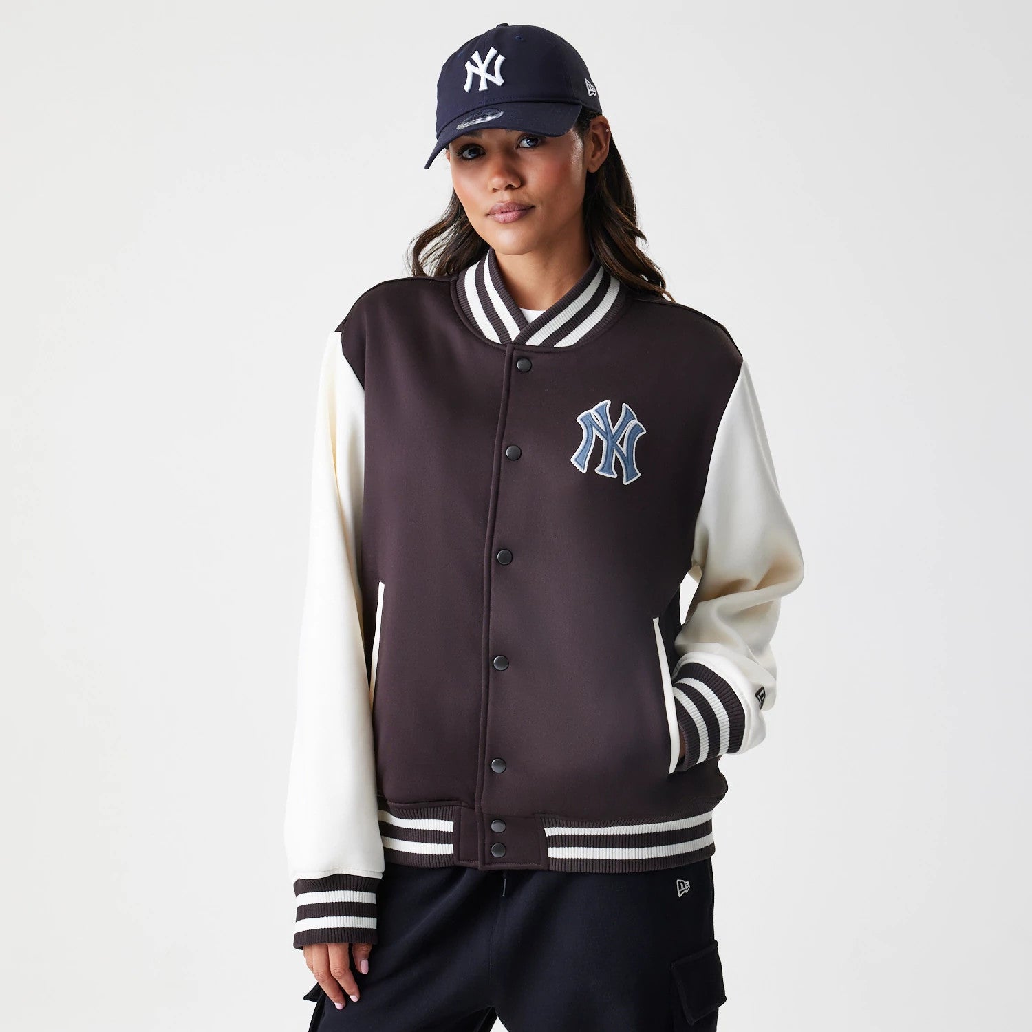 The Male model is wearing New York Yankees MLB Dark Brown Varsity Jacket 4