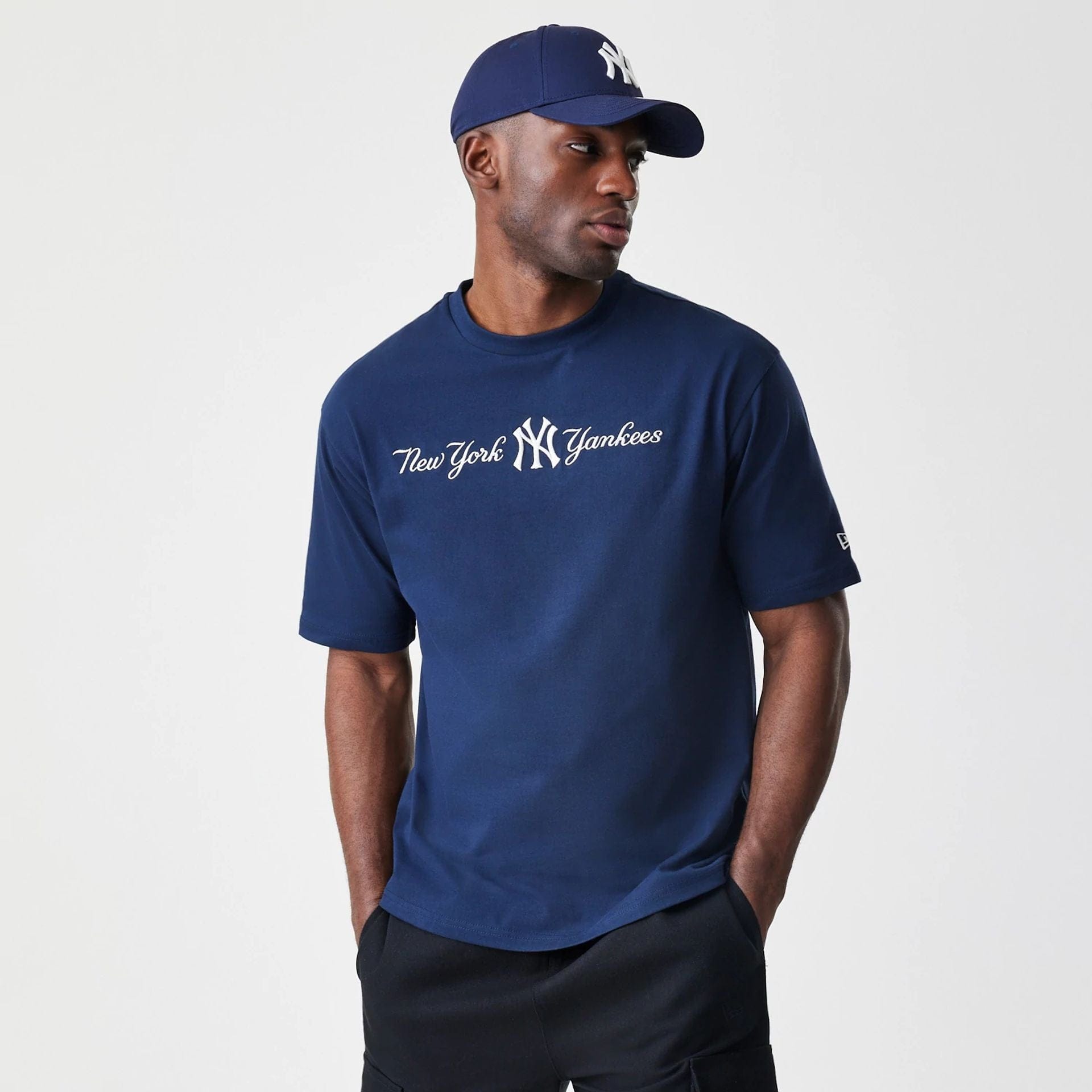 The Male model is wearing New York Yankees MLB Script Navy Oversized T-Shirt 1