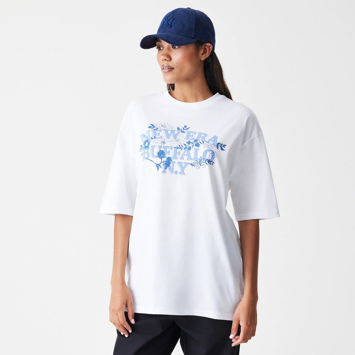 The Male model is wearing New Era Floral White Oversized T-Shirt 4