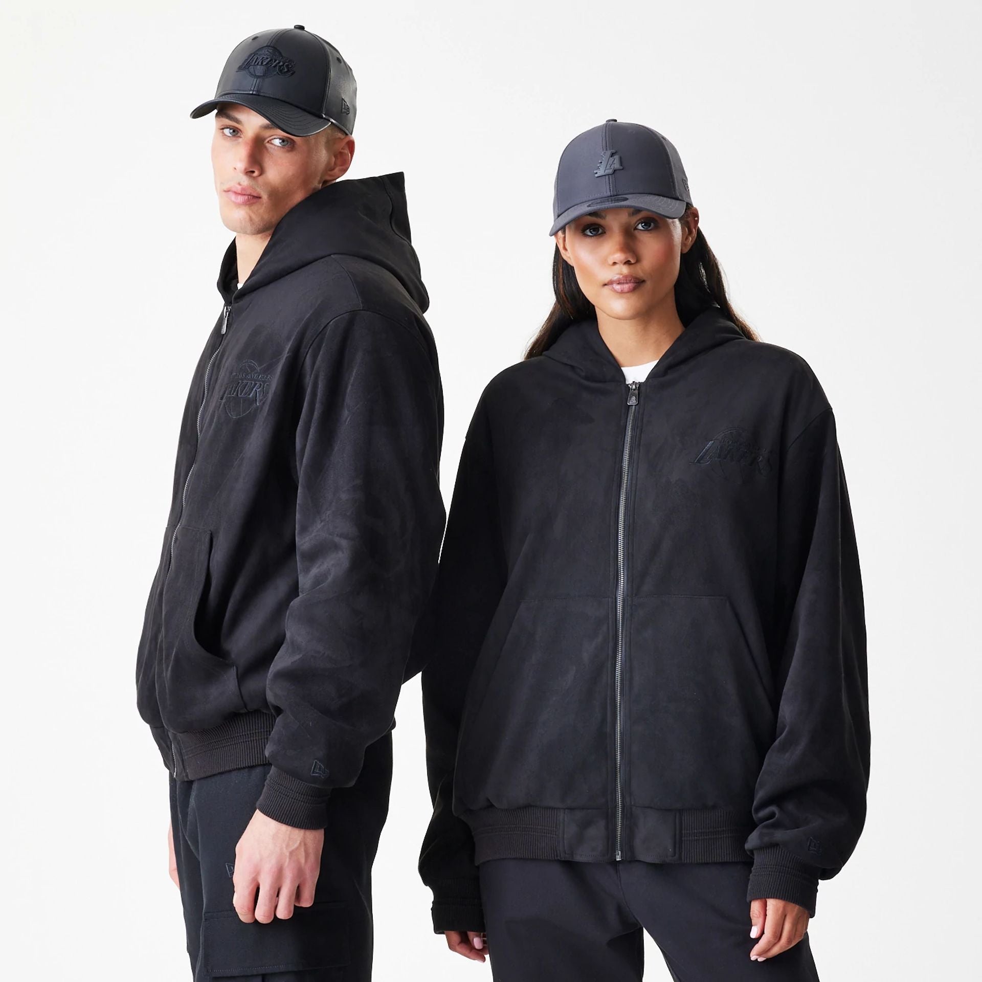 The Male model is wearing LA Lakers NBA Suede Black Hooded Jacket 1