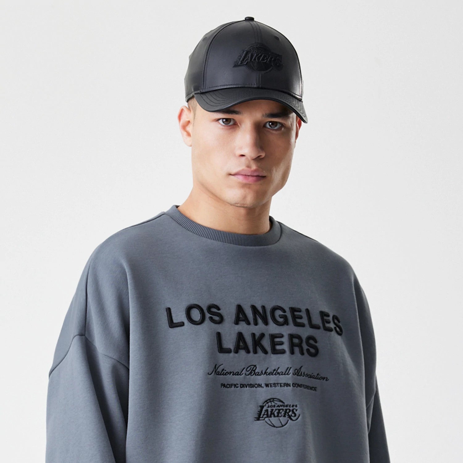 The Male model is wearing LA Lakers NBA Linear Dark Grey Crew Neck Sweater 3