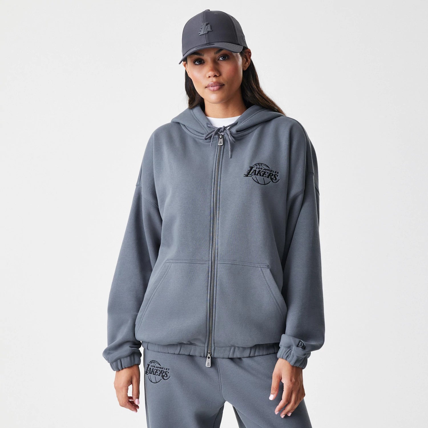 The Male model is wearing LA Lakers NBA Linear Dark Grey Oversized Full Zip Hoodie 4