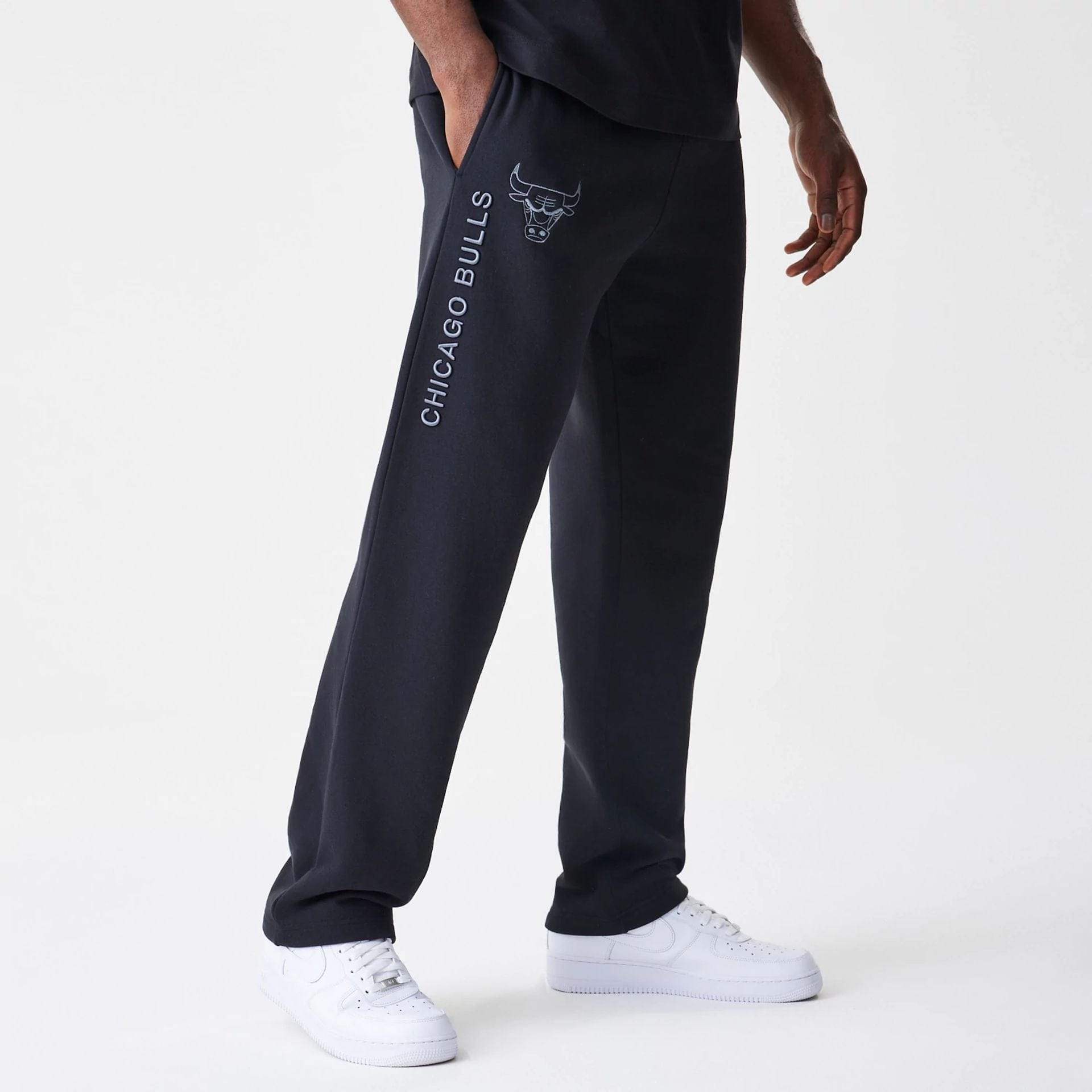 The Male model is wearing Chicago Bulls NBA Linear Black Straight Leg Joggers 1