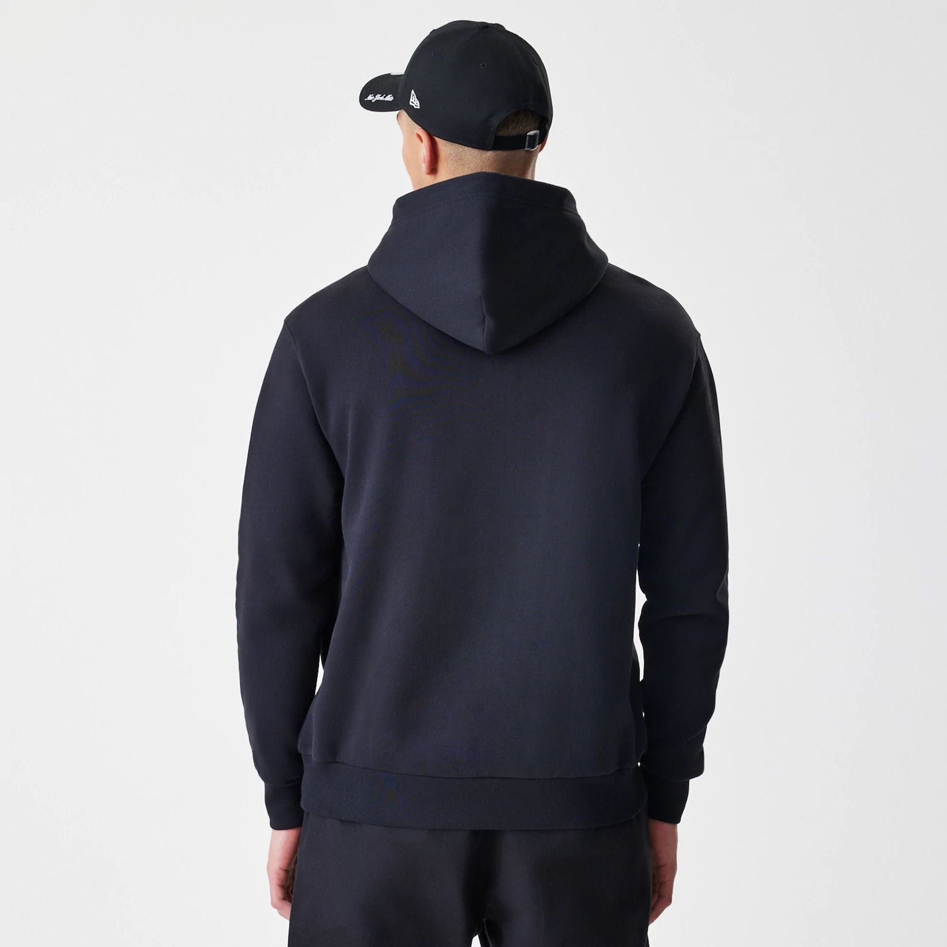 The Male model is wearing New York Mets MLB Script Black Oversized Pullover Hoodie 2