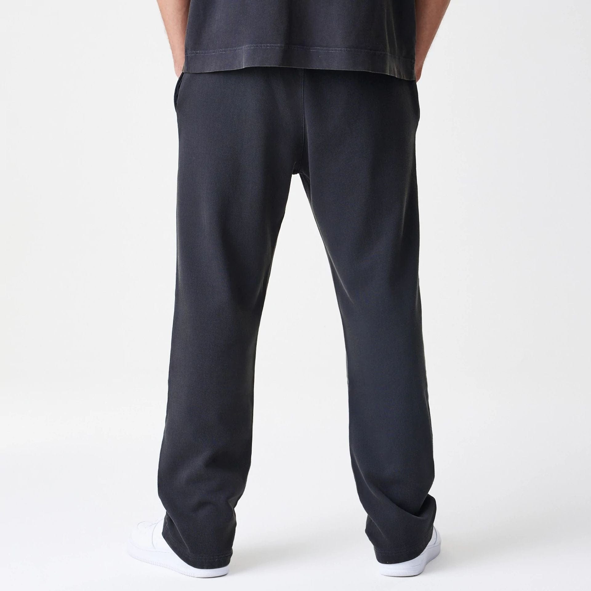 The Male model is wearing New Era Washed Black Straight Leg Joggers 2